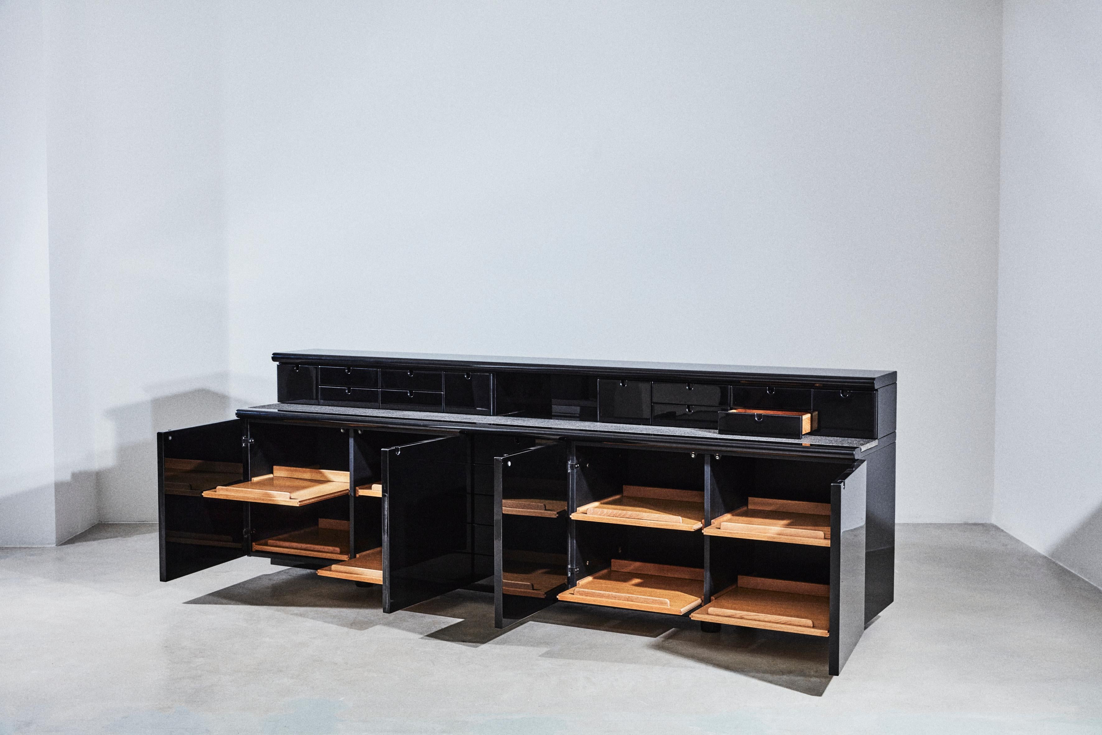 Stone Black lacquered wood and stone sideboard. Drawing Guido Faleschini For Sale
