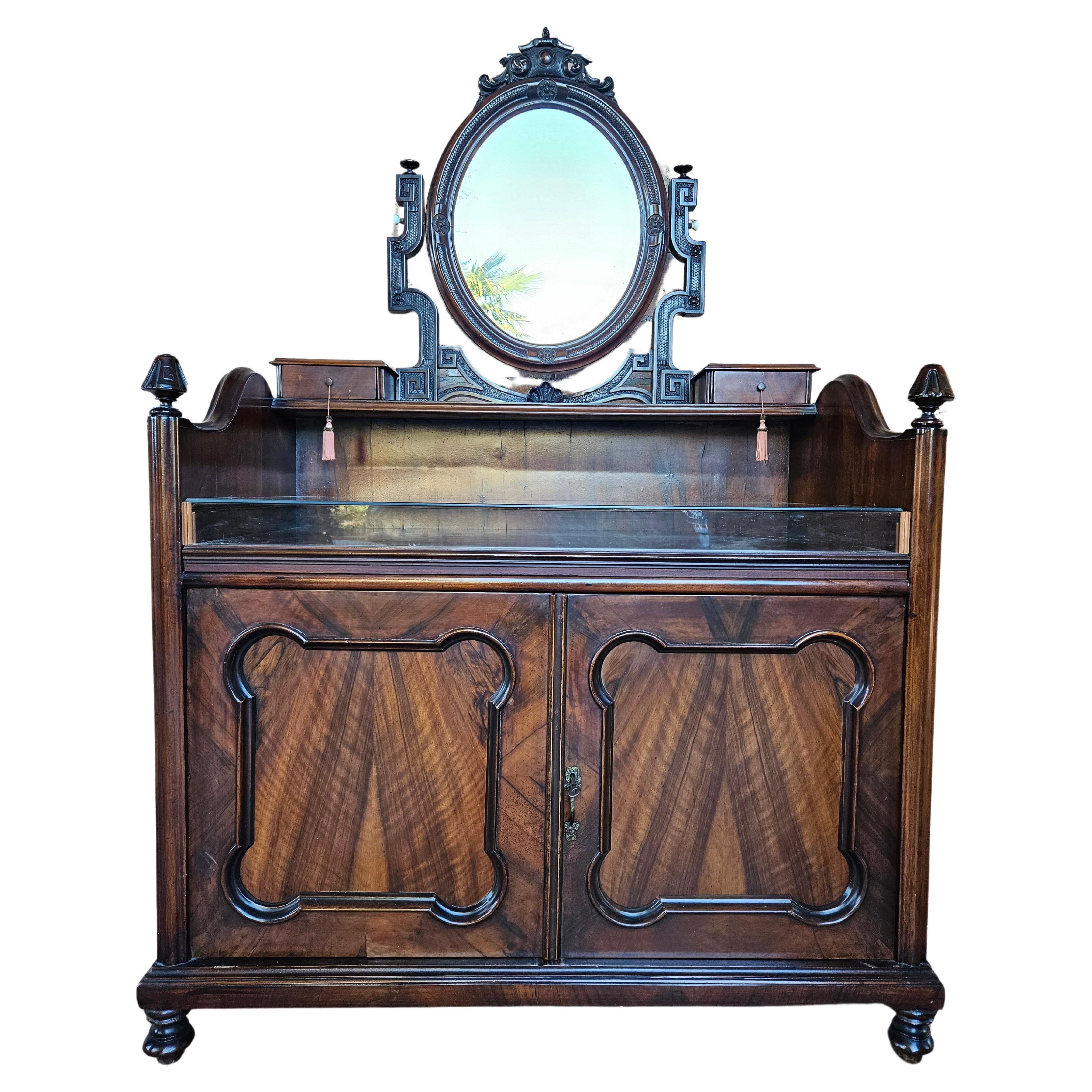 Mahogany sideboard with glass display and revolving mirror late 19th century For Sale