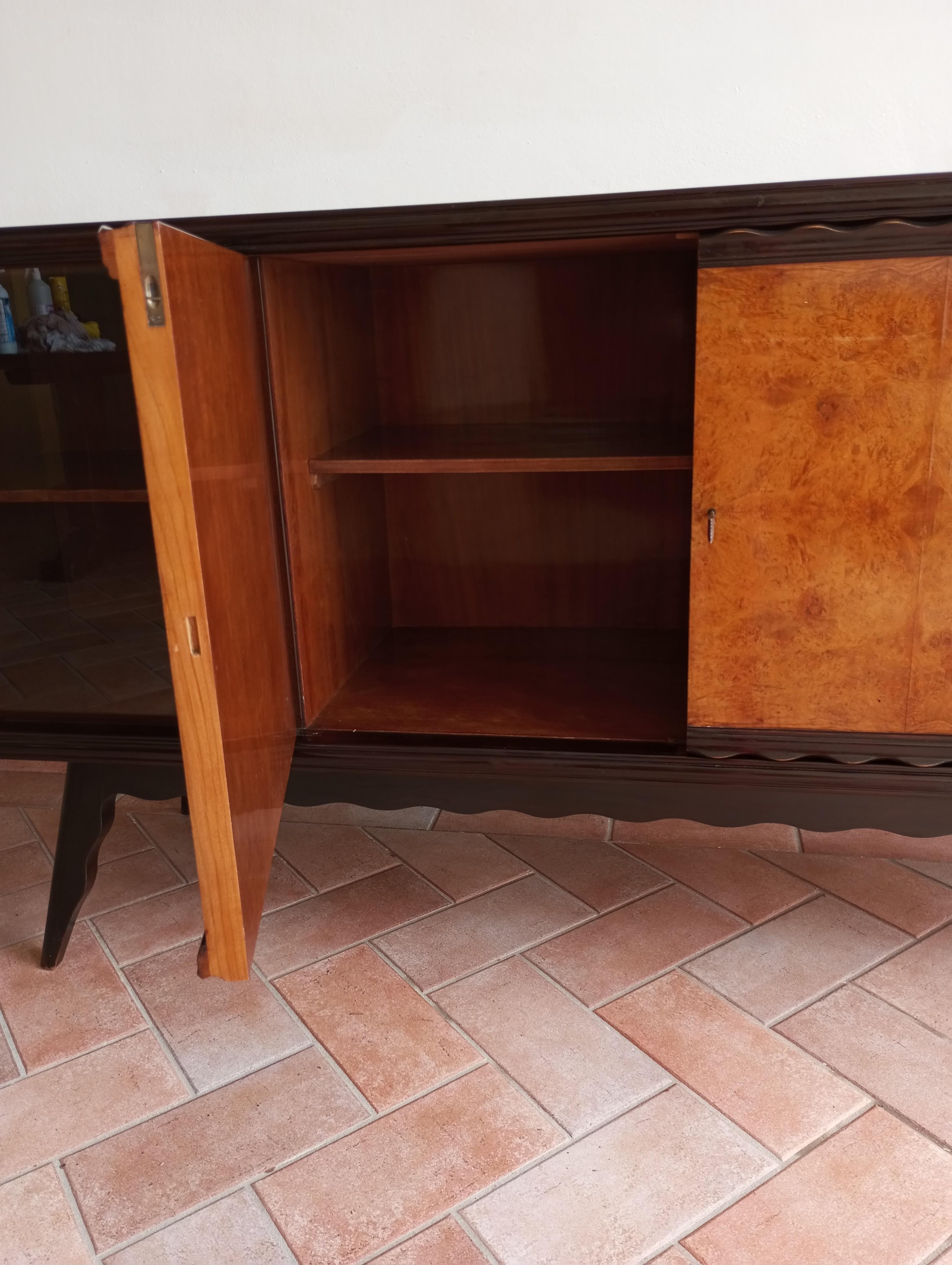 Mid-20th Century Italian oak sideboard with sliding glass doors. For Sale