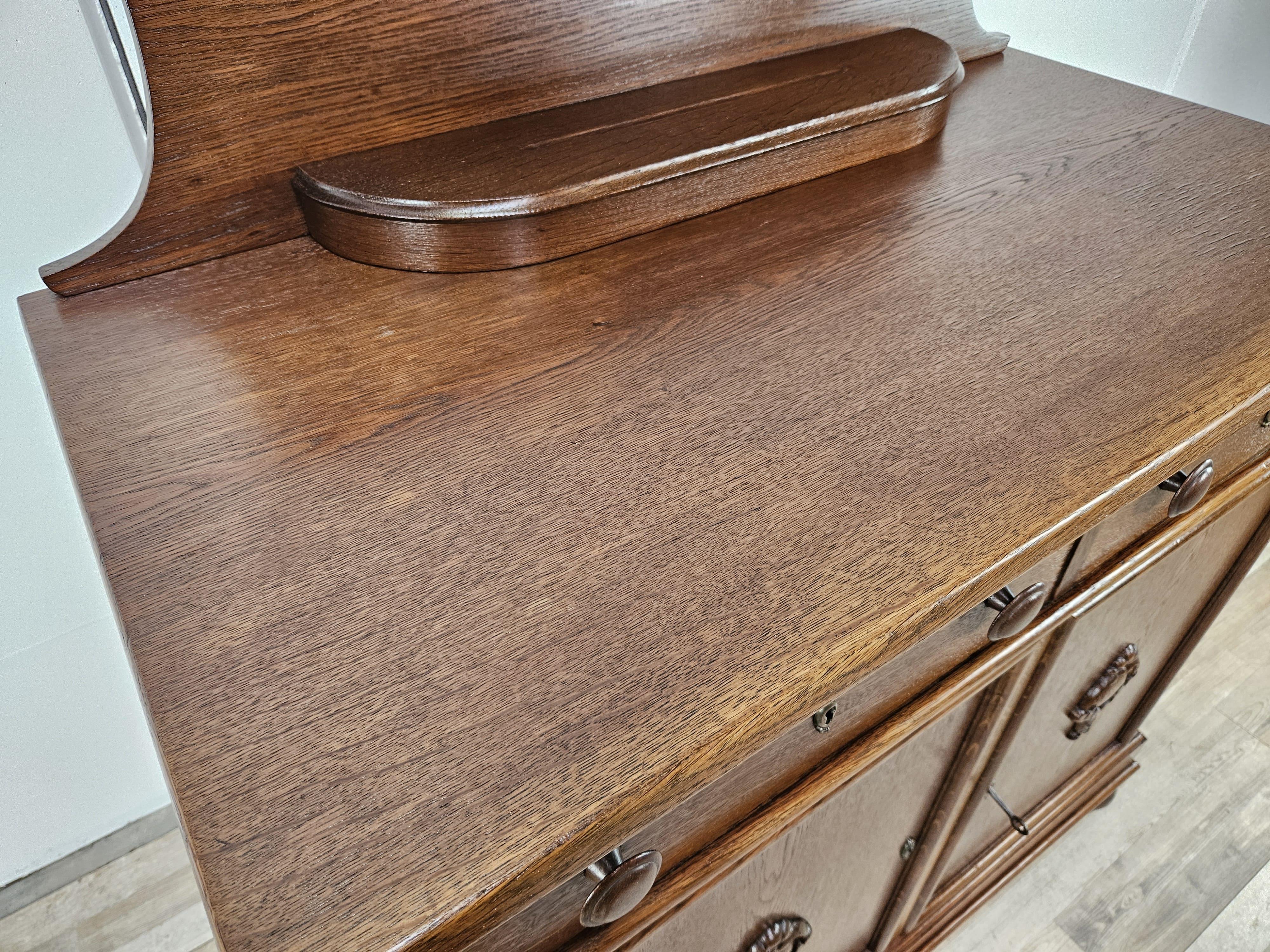 Mid-20th Century Art deco oak sideboard with riser and drawers 1940s