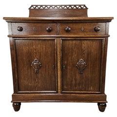 Art deco oak sideboard with riser and drawers 1940s