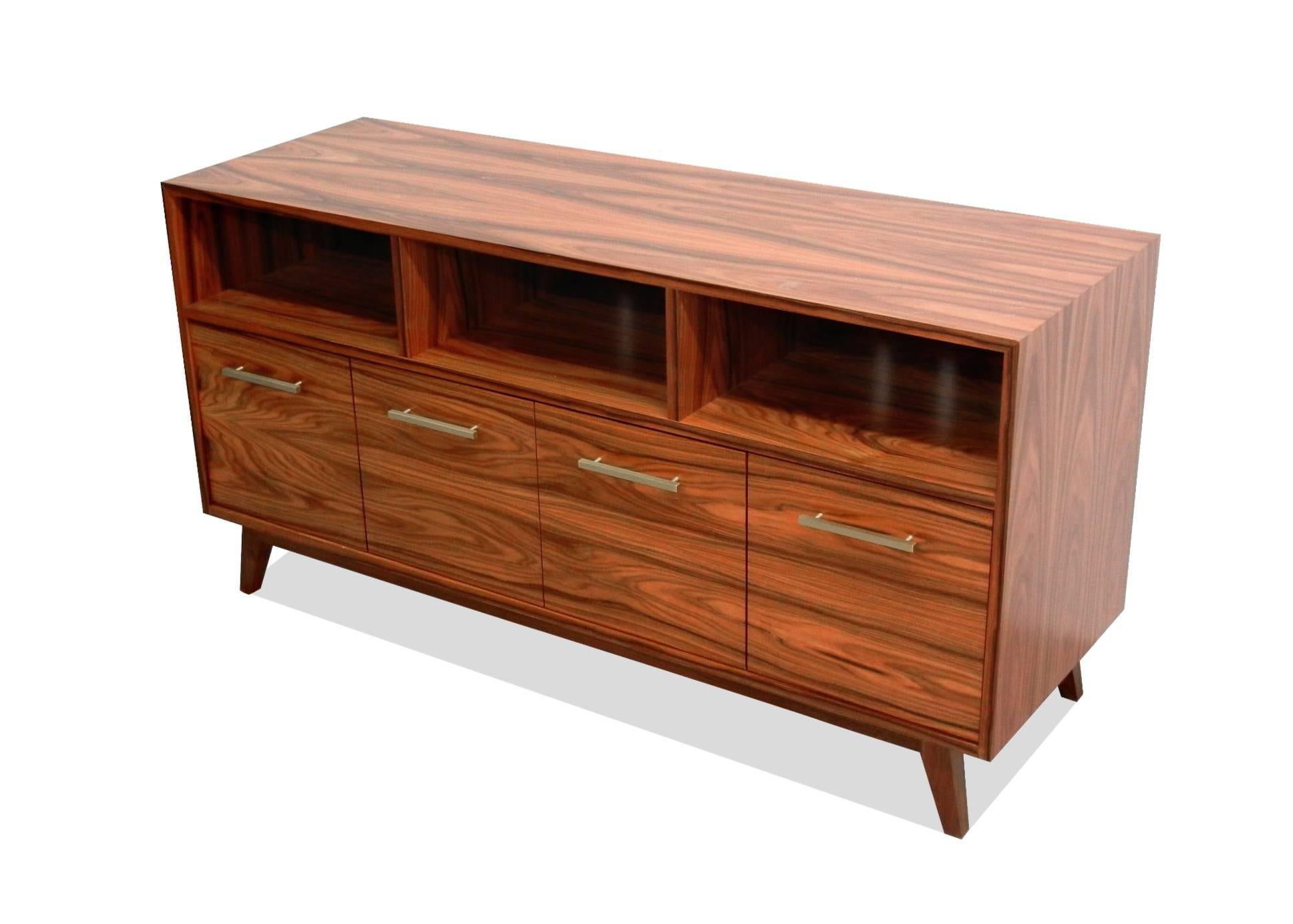 Atocha design references midcentury album storage and Hi-Fi style, but is updated for the needs of the 21st century music lover.

The Long Low Record Cabinet features four soft-closing drawers for albums and three open, rear-vented shelves for