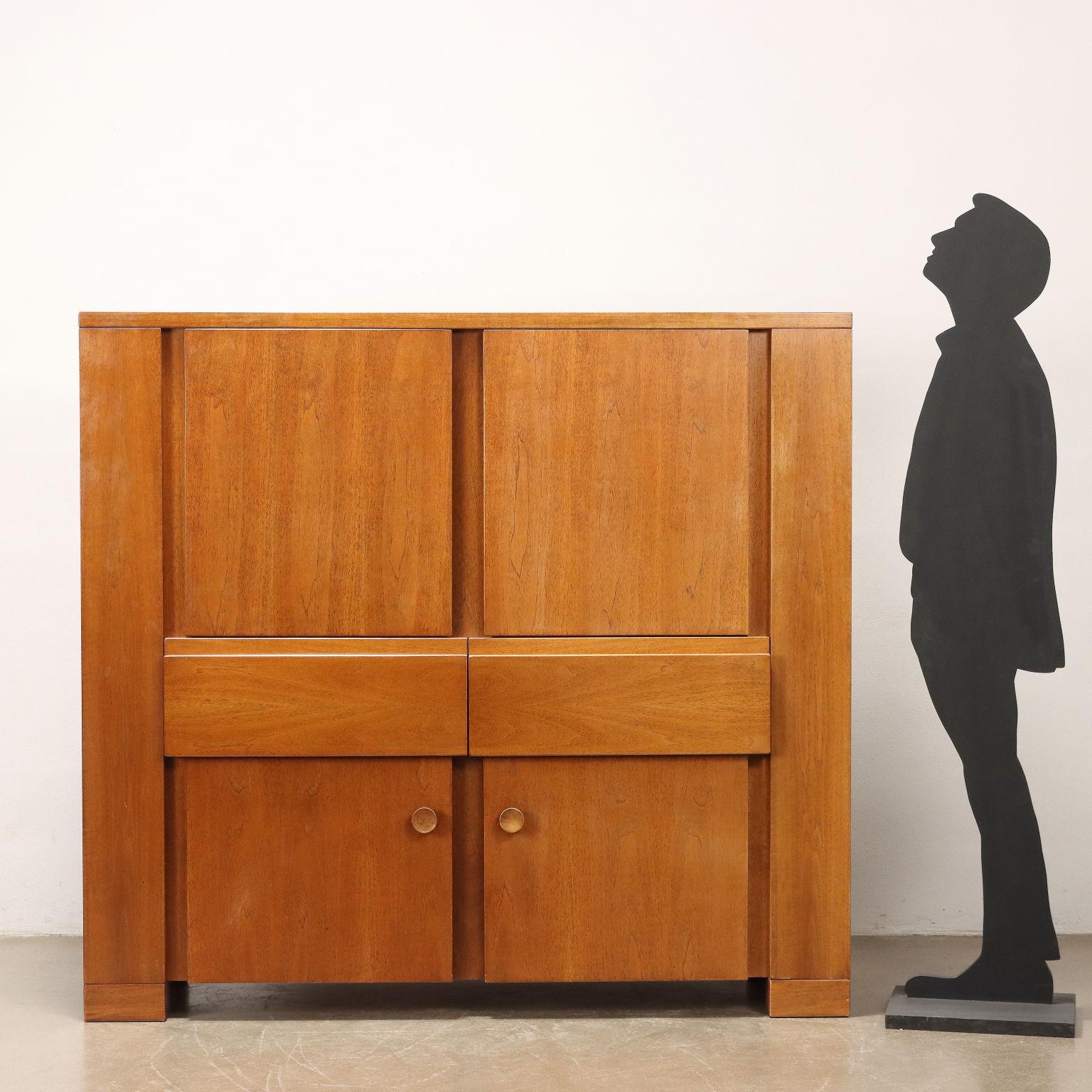 Sideboard cabinet with hinged doors and exposed drawers, designed by Michelucci in 1964; walnut veneer wood. Good Condition
