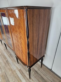 Vintage 1960s walnut display cabinet with glass doors and a glass top