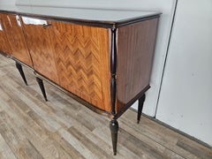 Vintage 1960s walnut sideboard with a glass top