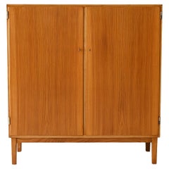 Vintage sideboard with hinged doors