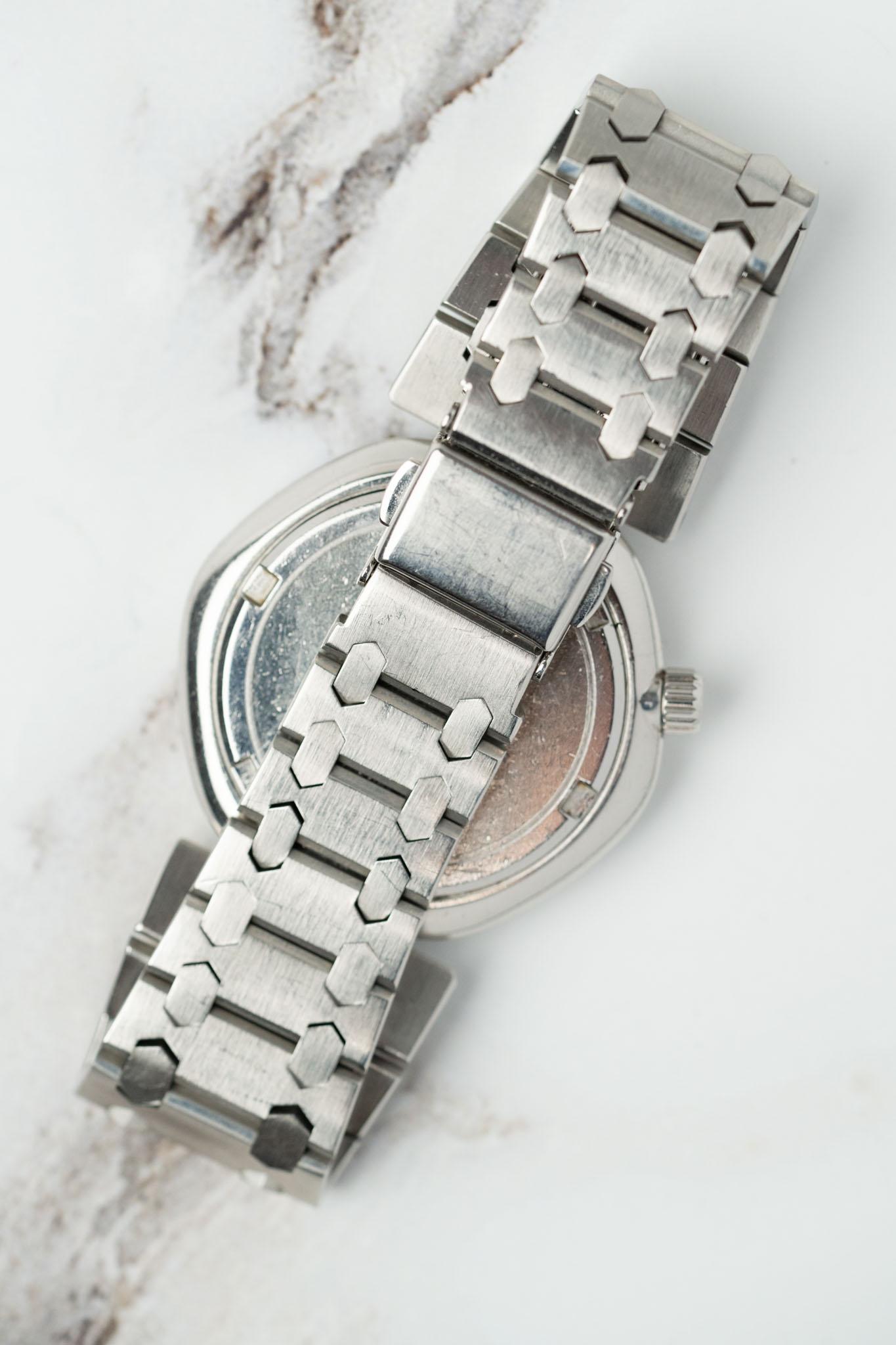 Credor Lokomotive KEH018 5932-5020 Texturiertes schwarzes Sonnenschliff-Zifferblatt von Gerald Genta für Damen oder Herren im Angebot