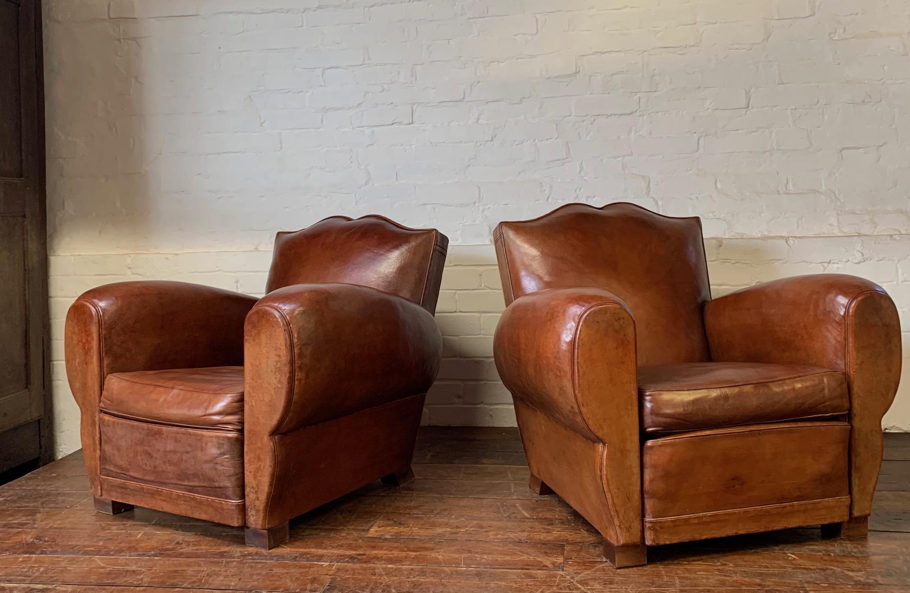 La Crème de La Crème, Pair of 1940’s French Leather Club Chairs Havana Moustache Models

This beautiful and truly iconic pair of chairs is in the finest, original condition that we have seen for a very long time. The original Havana colour has