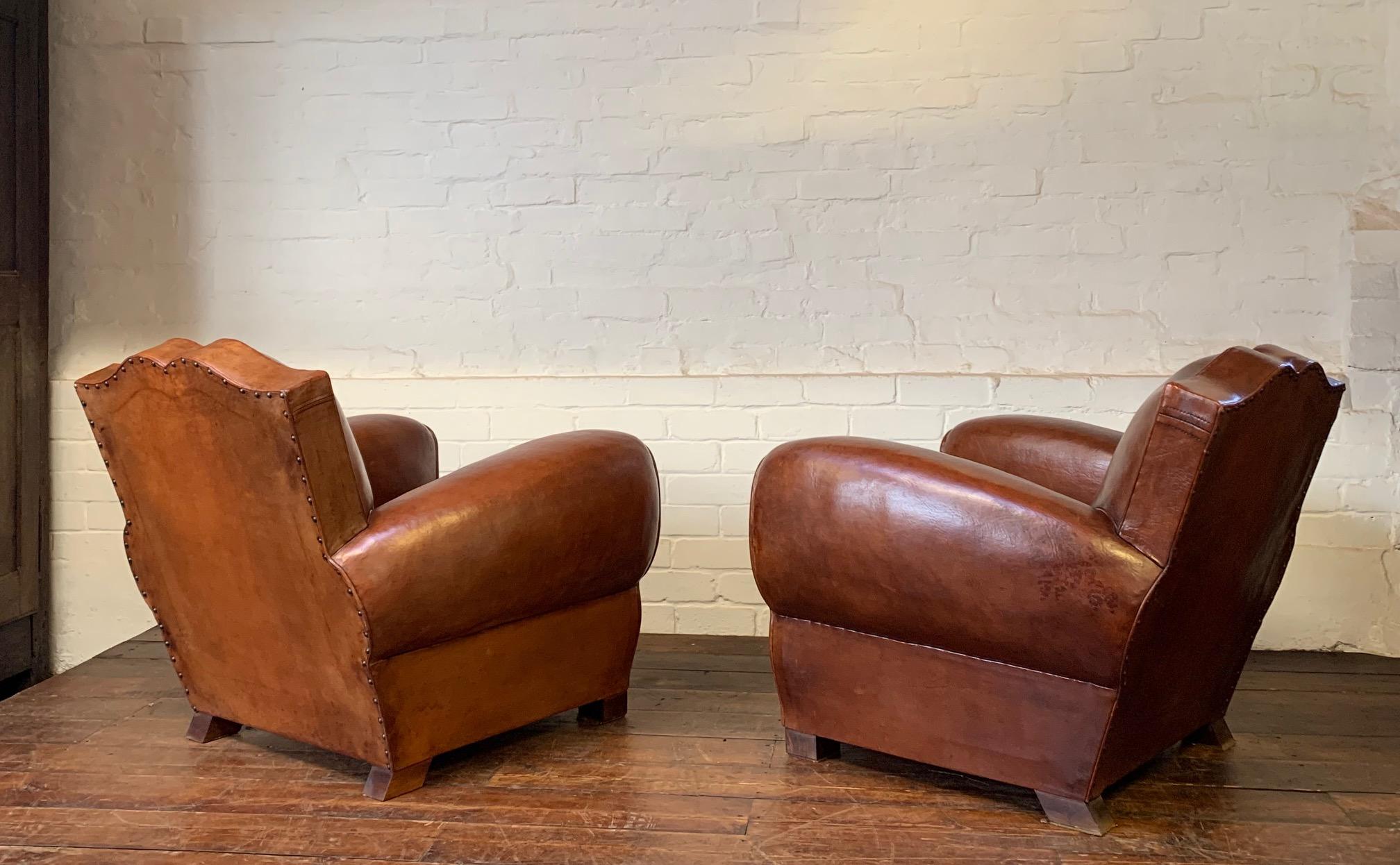 Crème de la crème! A pair of 1940's French Leather Club Chairs Moustache Models In Good Condition For Sale In Hastings, GB