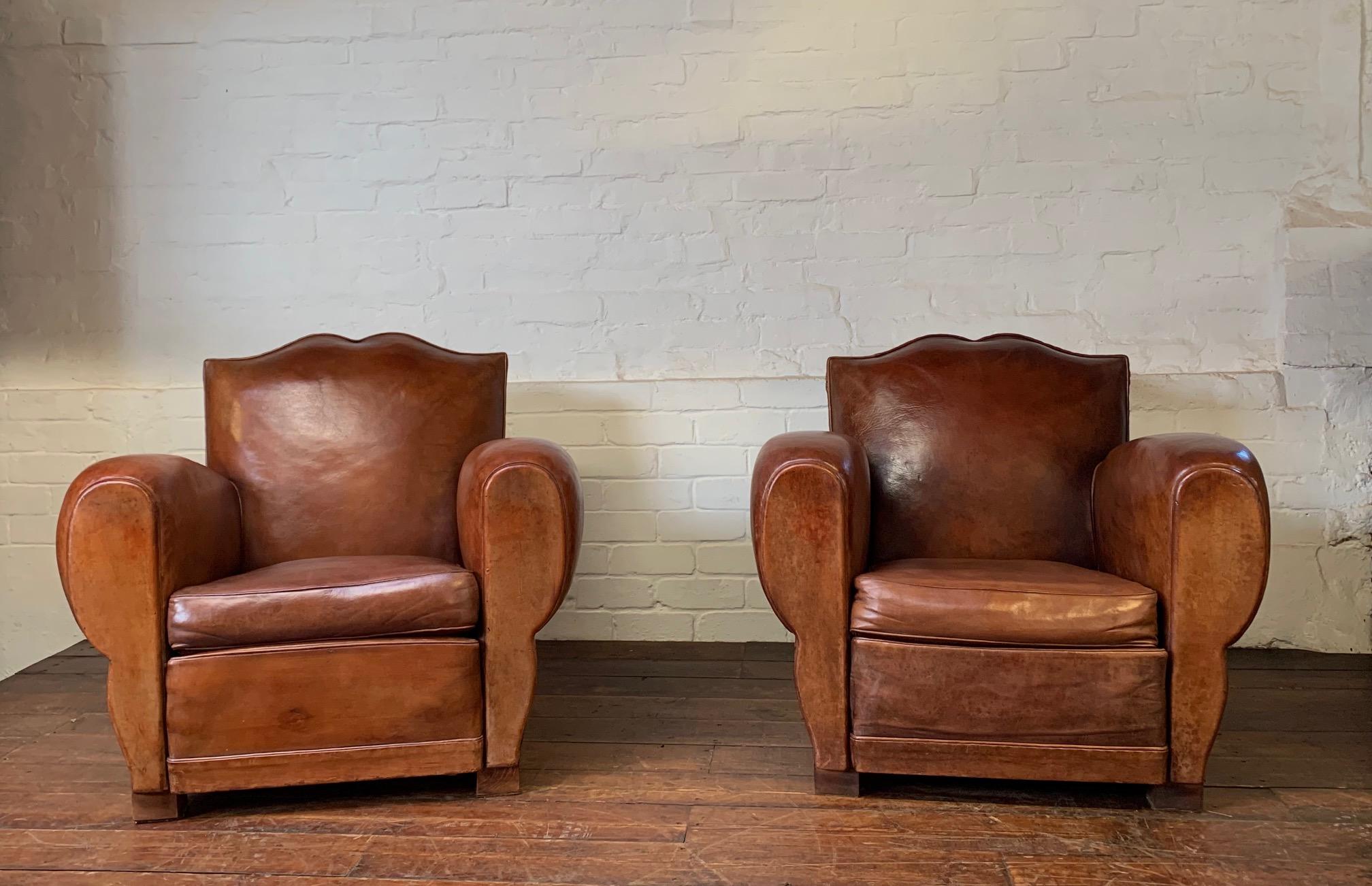 20th Century Crème de la crème! A pair of 1940's French Leather Club Chairs Moustache Models For Sale