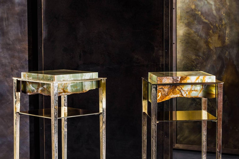 Each of these unique tables by acclaimed artist and master-craftsman, Gianluca Pacchioni, is handcrafted at the sculptor's studio in Milan. Slabs of individually sourced and hand-hewn green onyx are suspended mid-air by uncannily thin legs. 

A