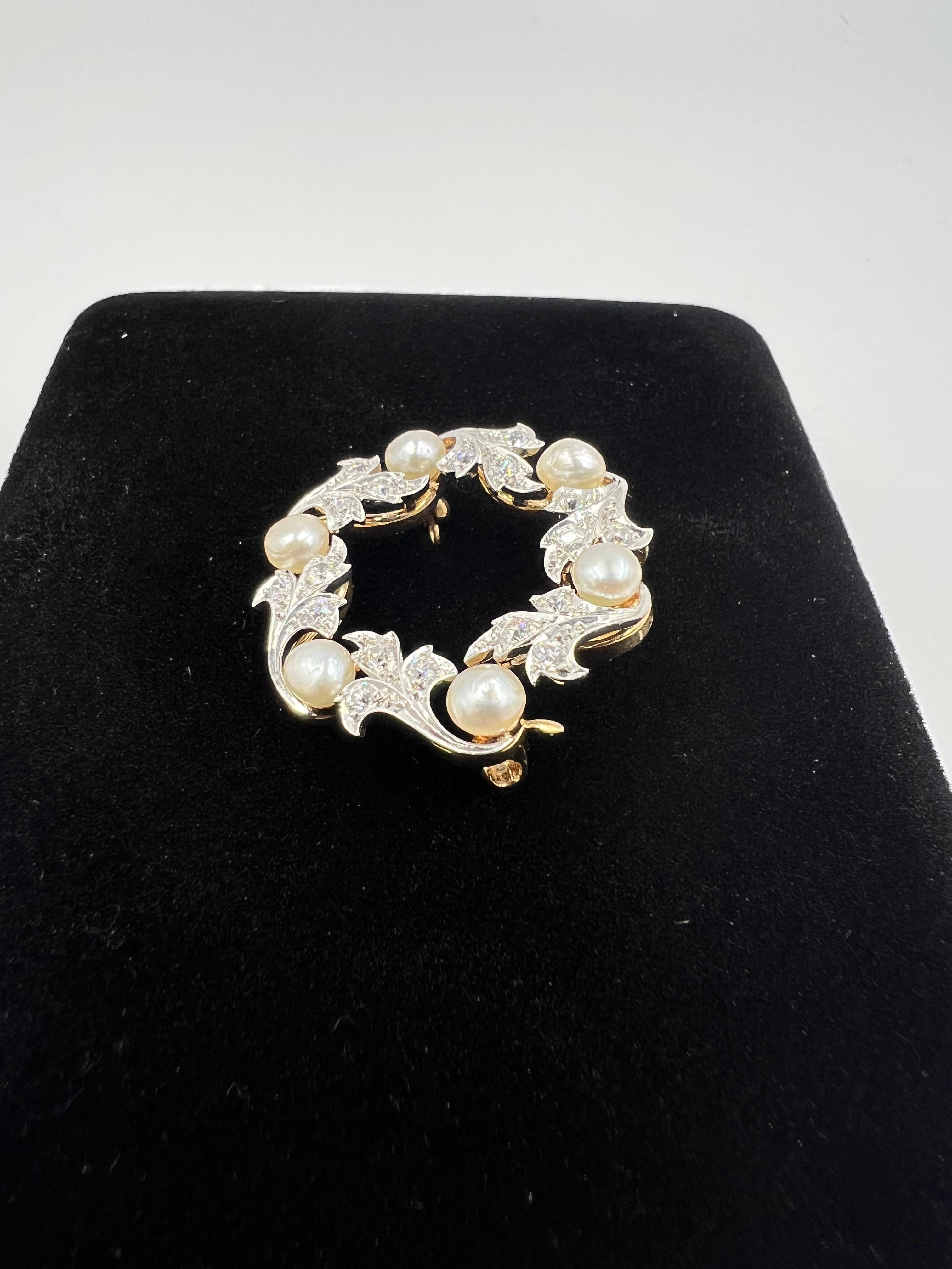 Cresarrow Diamond and Pearl platinum and yellow gold wreath brooch, circa 1900.

Craftmanship, craftmanship, that is what this company Cresarrow by Whiteside and Blank Co. were known for. This beautifully crafted brooch is a testament to that. The
