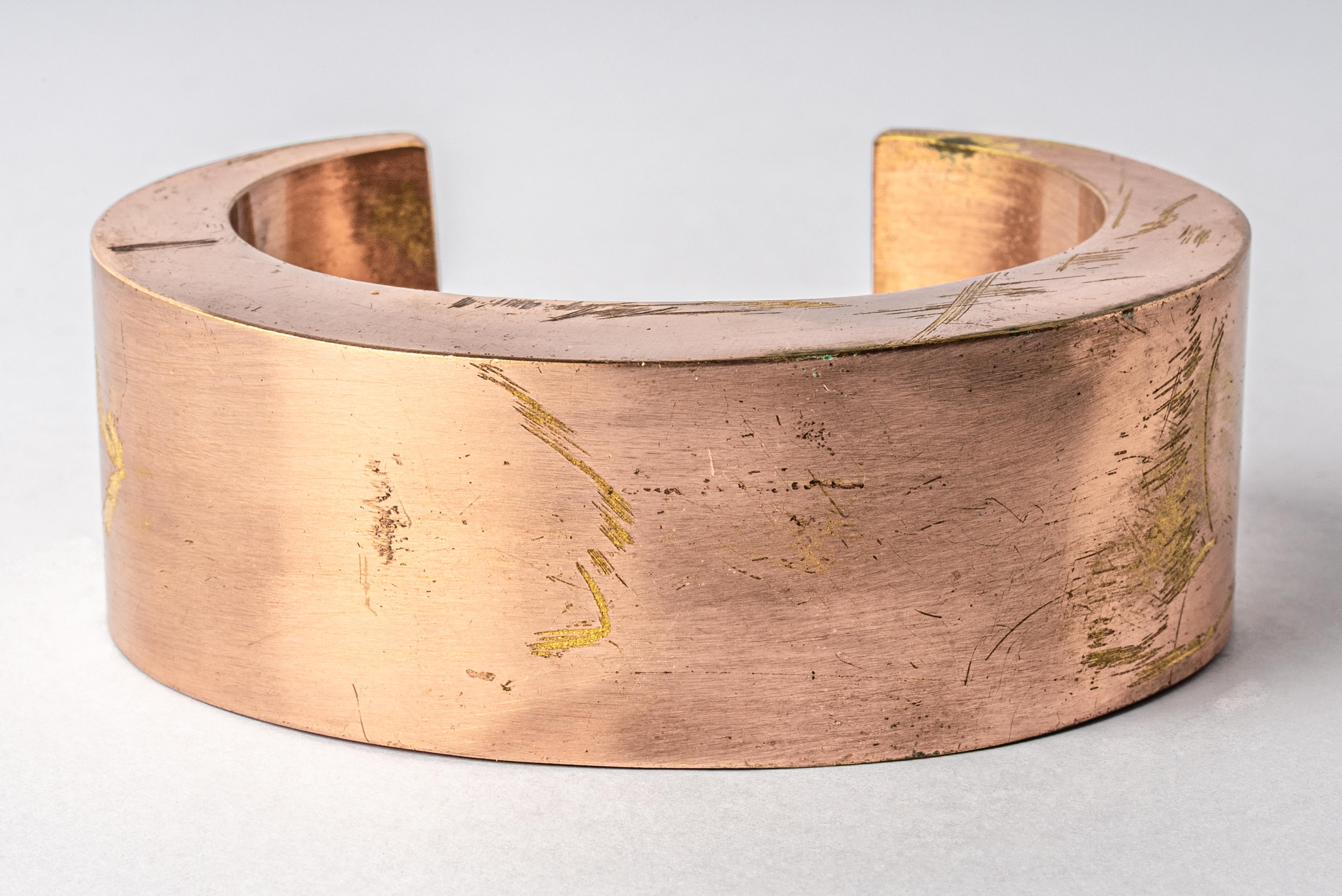 Bracelet in brass. Brass substrate is electroplated with 18k Rose Gold and then dipped into acid to create the subtly destroyed surface. This piece is 100% hand fabricated from metal plate; cut into sections and soldered together to make the hollow