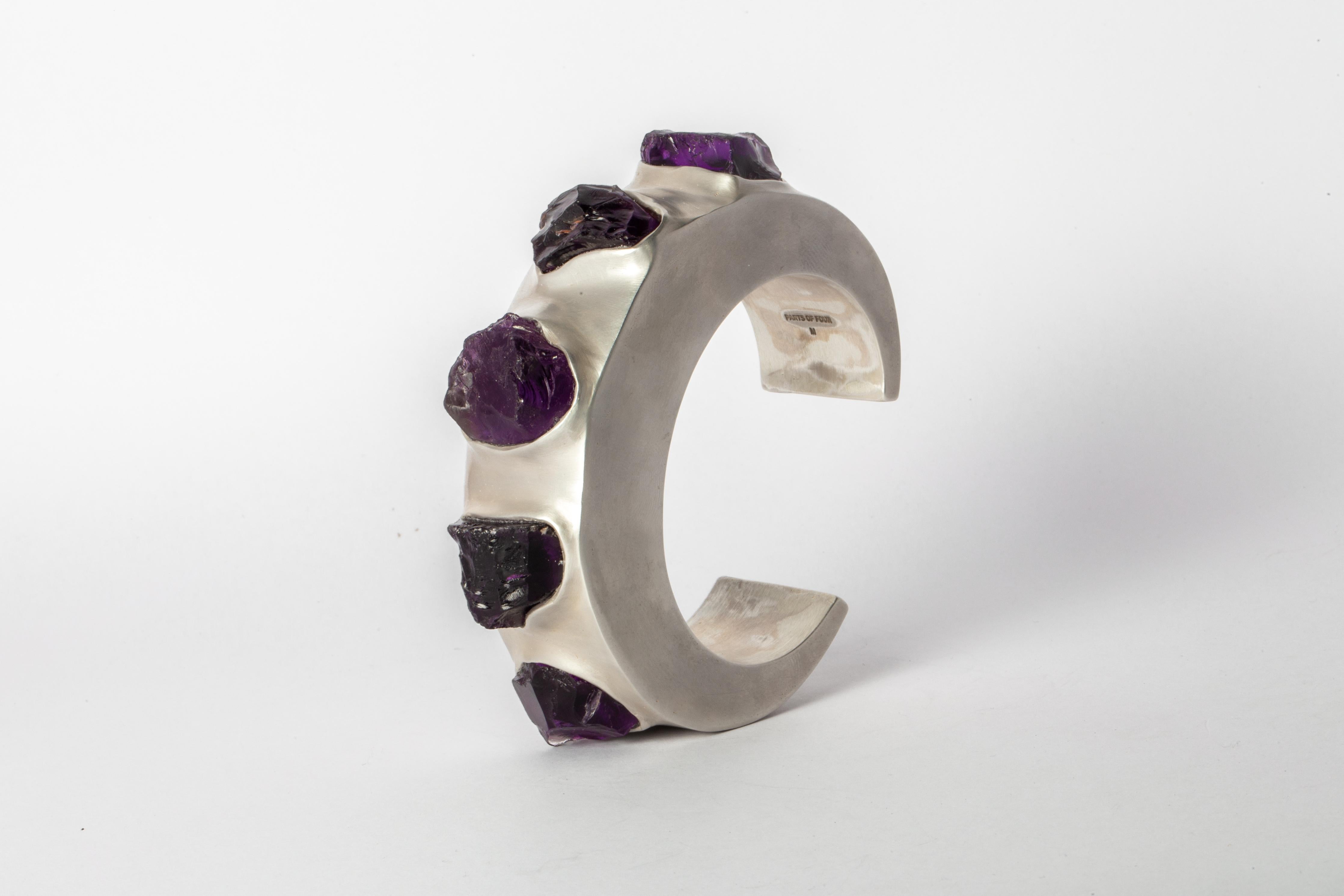Bracelet in sterling silver and slabs of rough amethyst. This item is made with a naturally occurring element and will vary from the photograph you see. Each piece is unique and this is what makes it special. We use facet-grade rough gemstones which