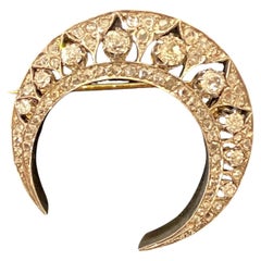 Spilla "Crescent" in oro e argento. Portoghese, XIX/XX secolo