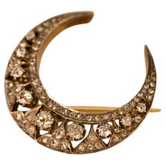Spilla "Crescent" in oro e argento. Portoghese, XIX/XX secolo