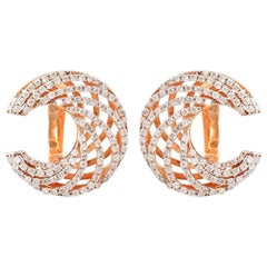 Clous d'oreilles en or rose 18 carats avec diamants en forme de croissant