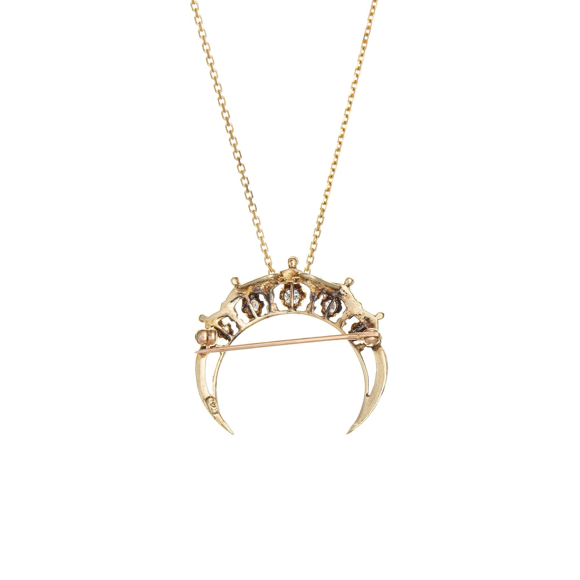 Finely detailed crescent moon diamond pendant/brooch crafted in 14k yellow gold (circa 1950s to 1960s).  

Diamonds total an estimated 0.35 carats (estimated at H-I color and VS2-SI2 clarity).

Round brilliant cut diamonds graduate in size from 0.05