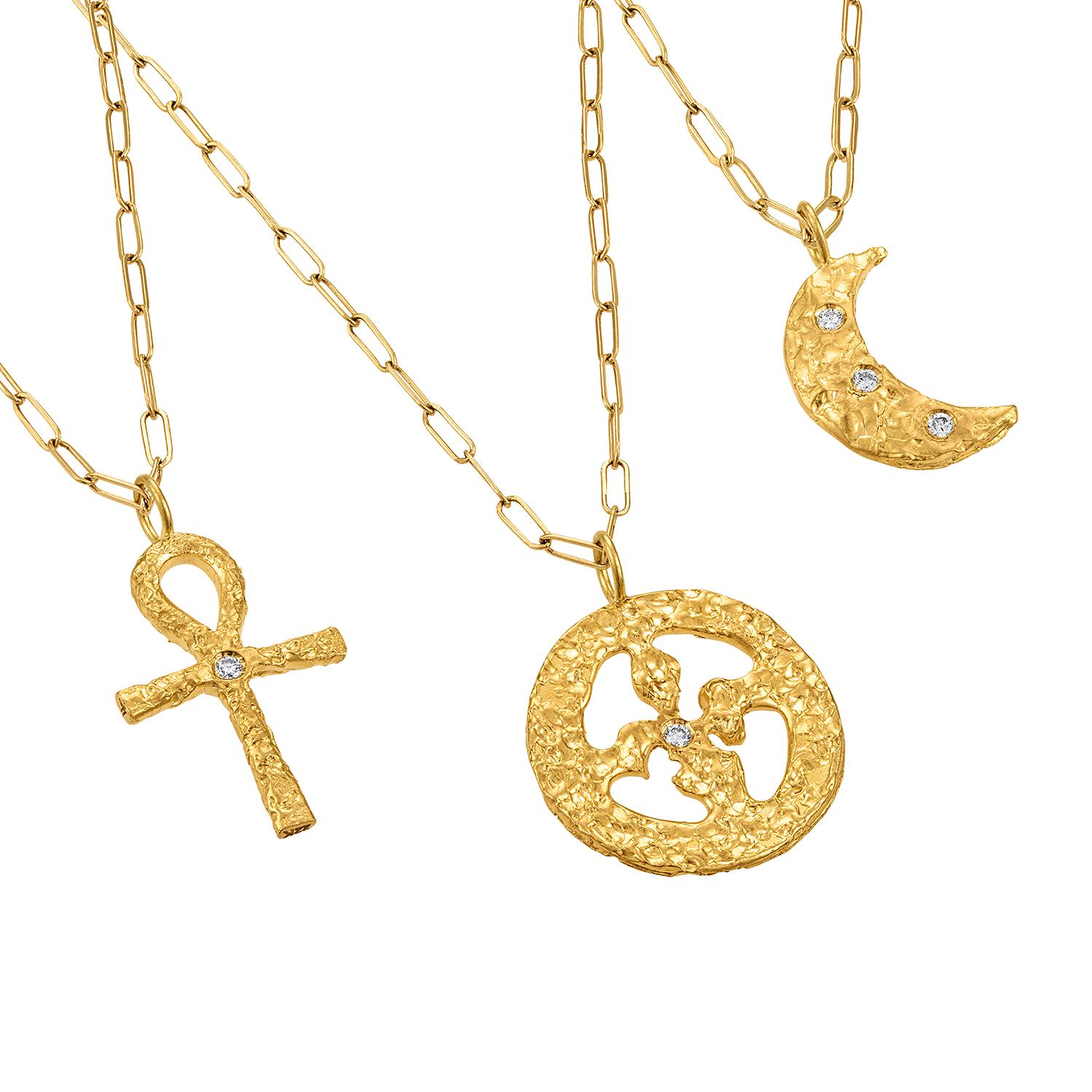 This exquisite diamond Crescent Moon Mini Pendant is a stunning piece that combines modern design with timeless elegance. It is a unique meaningful piece of jewelry. Handmade from solid 22k gold and features a crescent moon symbol, The Moon is
