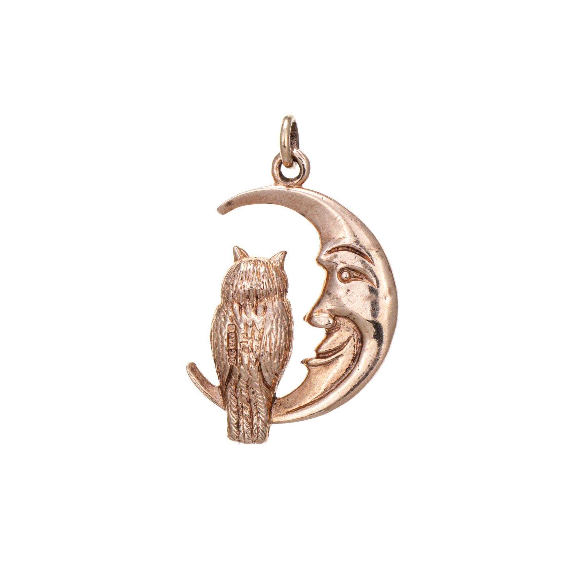 Finely detailed vintage crescent moon & owl charm crafted in 9k rose gold (circa 1960s to 1970s).  

Two lab rubies total an estimated 0.02 carats. 

The sweet charm highlights an owl perched on a crescent moon. Rendered in lifelike detail the piece