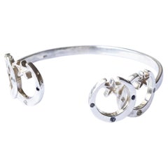Bracciale a cuffia con luna crescente e stella in argento, diamanti, tanzanite e rubini – Celestial
