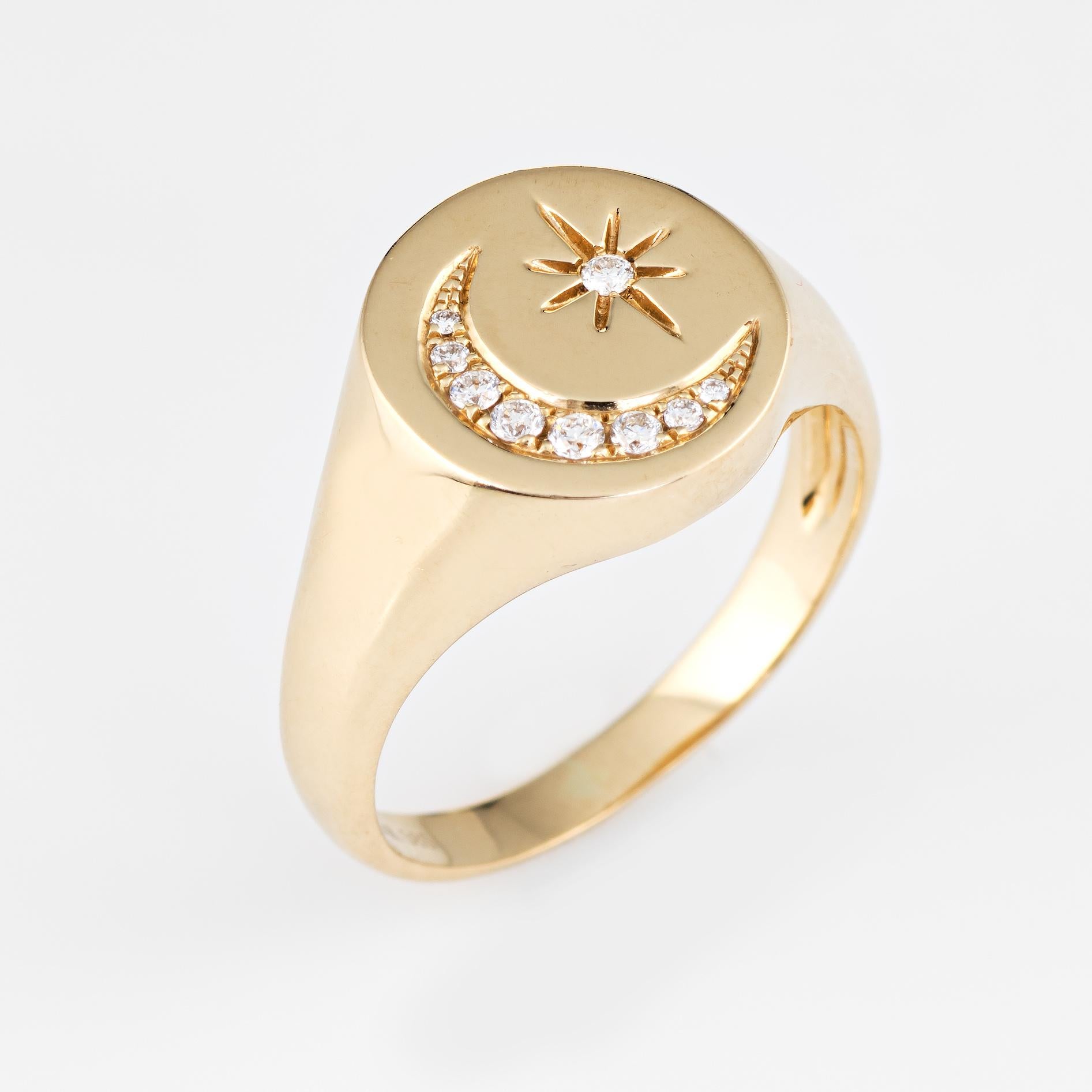 Elegant estate crescent moon & star diamond signet ring crafted in 14 karat yellow gold. 

Diamonds total an estimated 0.08 carats (estimated at H-I color and VS2-SI1 clarity). 

The signet ring features a crescent moon and star motif. The low