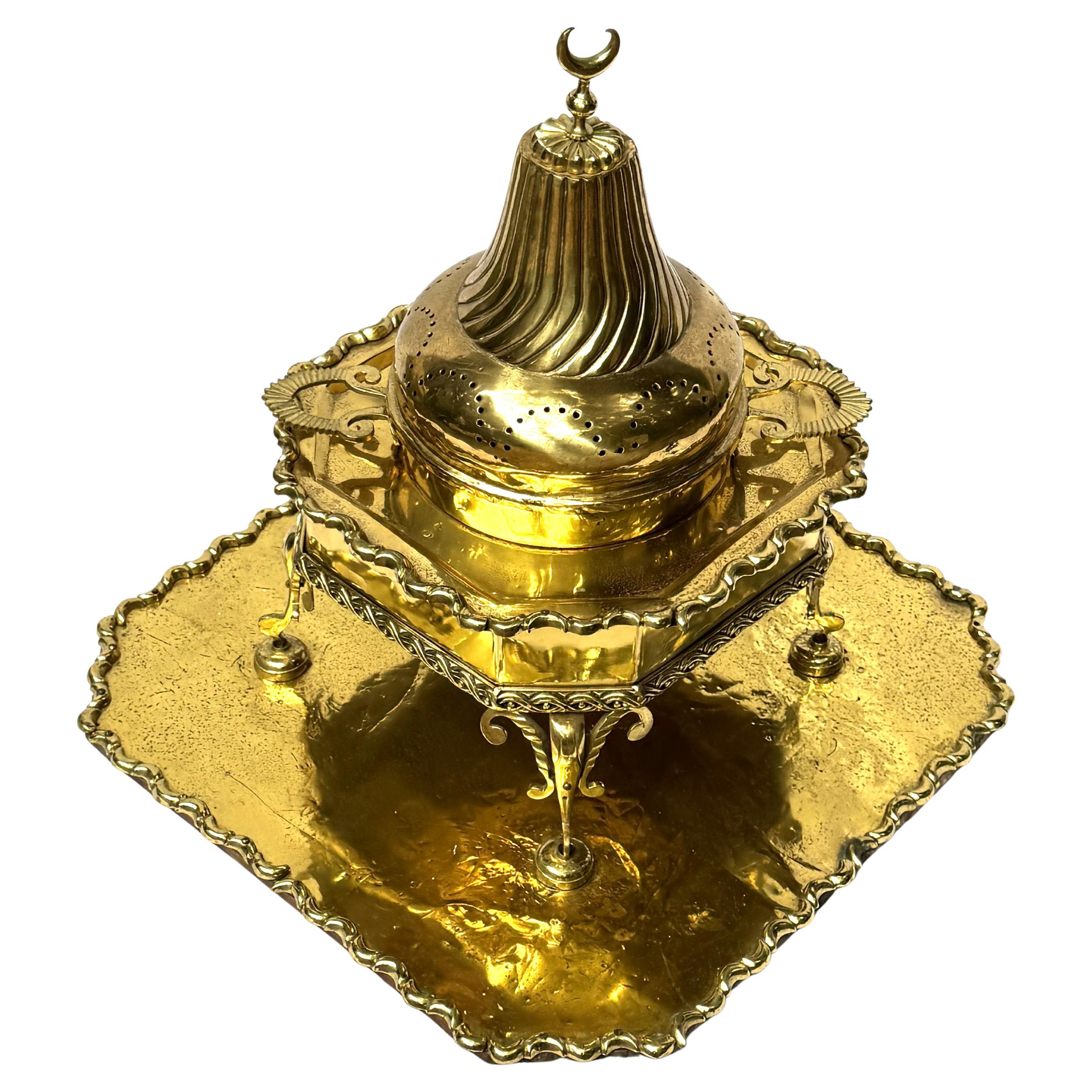 Crescent of Smoke: A Majestic Ottoman Censer in Brass and Wood, Circa 1900”
A vision of golden grandeur, this rare and evocative censer is a poetic relic of the East — an objet d’art that once perfumed the air of a refined chamber, a ceremonial