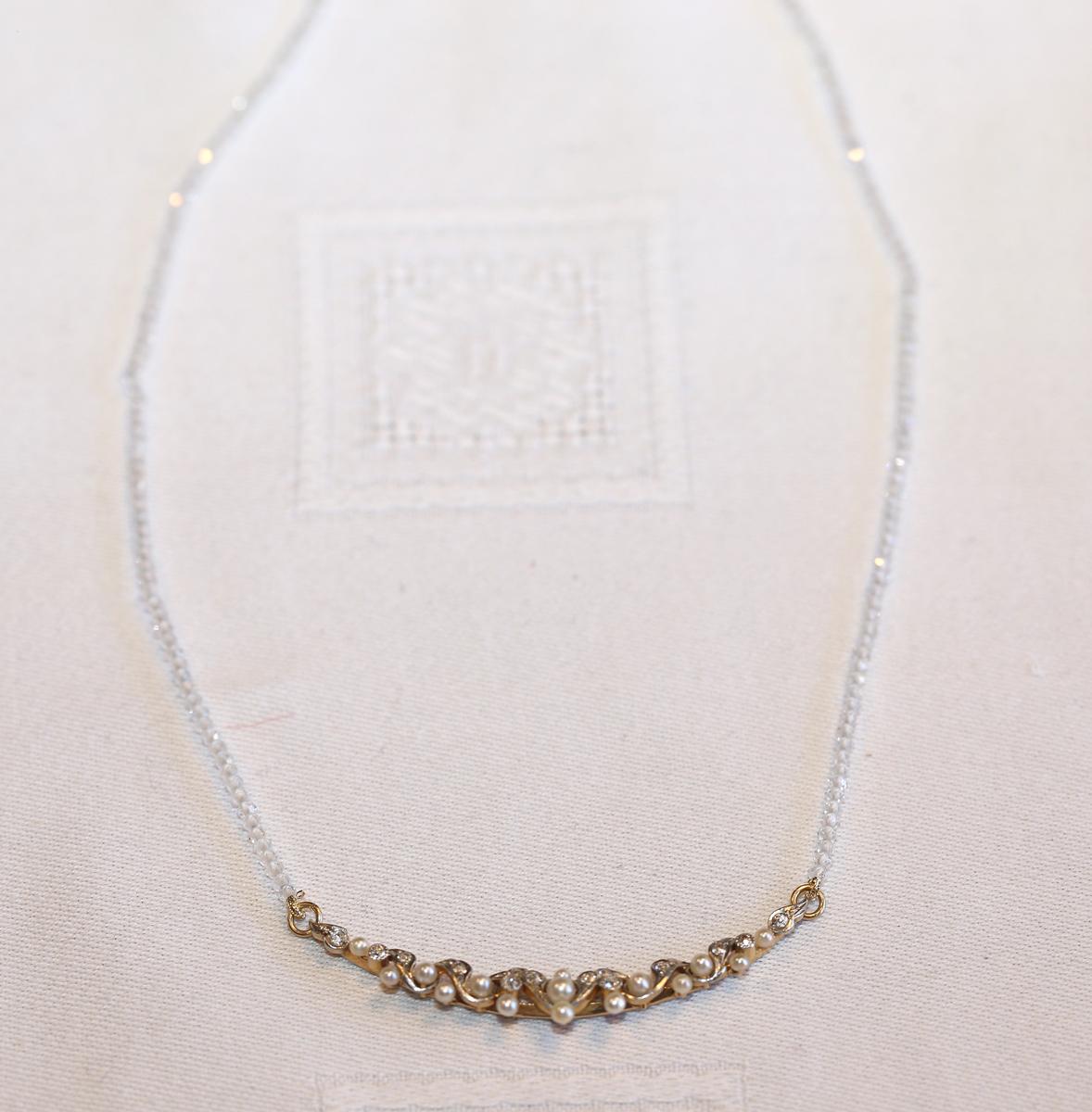 Pearls Old-Mine Diamonds Crescent pendant. Created around 1930.
Fine and delicate Pearls Old-mine Diamonds Crescent on rock crystal chain with the gold lock. A perfect accessory for any modern outfit. It is a joy to try to incorporate it with