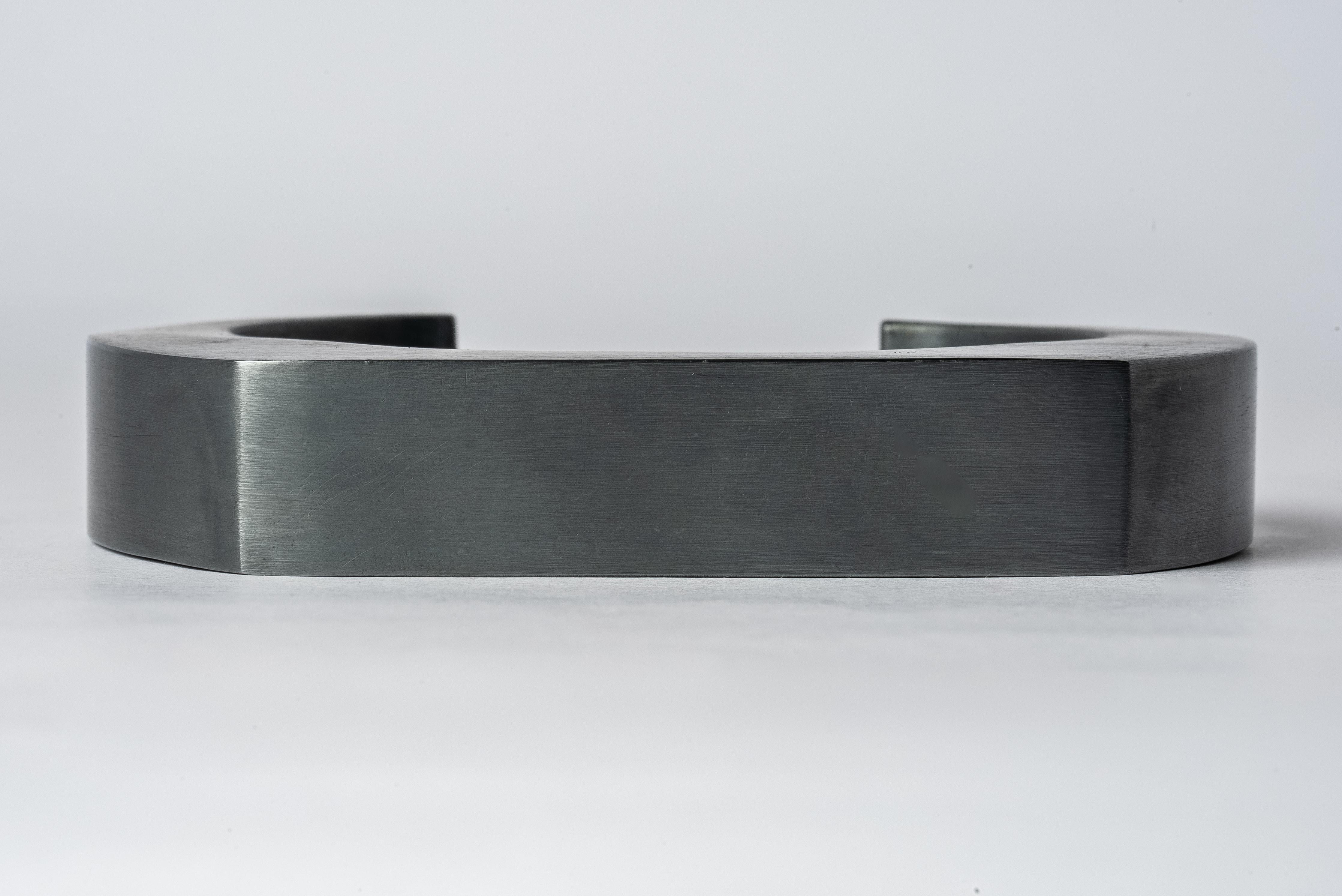Bracelet in oxidized sterling silver. This piece is 100% hand fabricated from metal plate; cut into sections and soldered together to make the hollow three dimensional form. 
