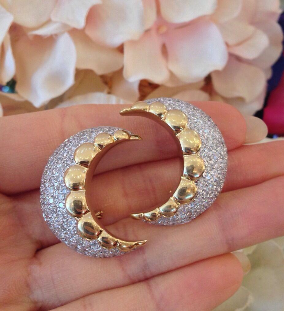 Diamond Pavé Crescent Shaped Earrings in 18K Yellow Gold

Beautiful Crescent shaped Diamond earrings feature 3.50 carats of Round Brilliant Diamonds Pavé set in 18k Yellow Gold with a Scalloped edge. The earrings are secured by posts with Omega