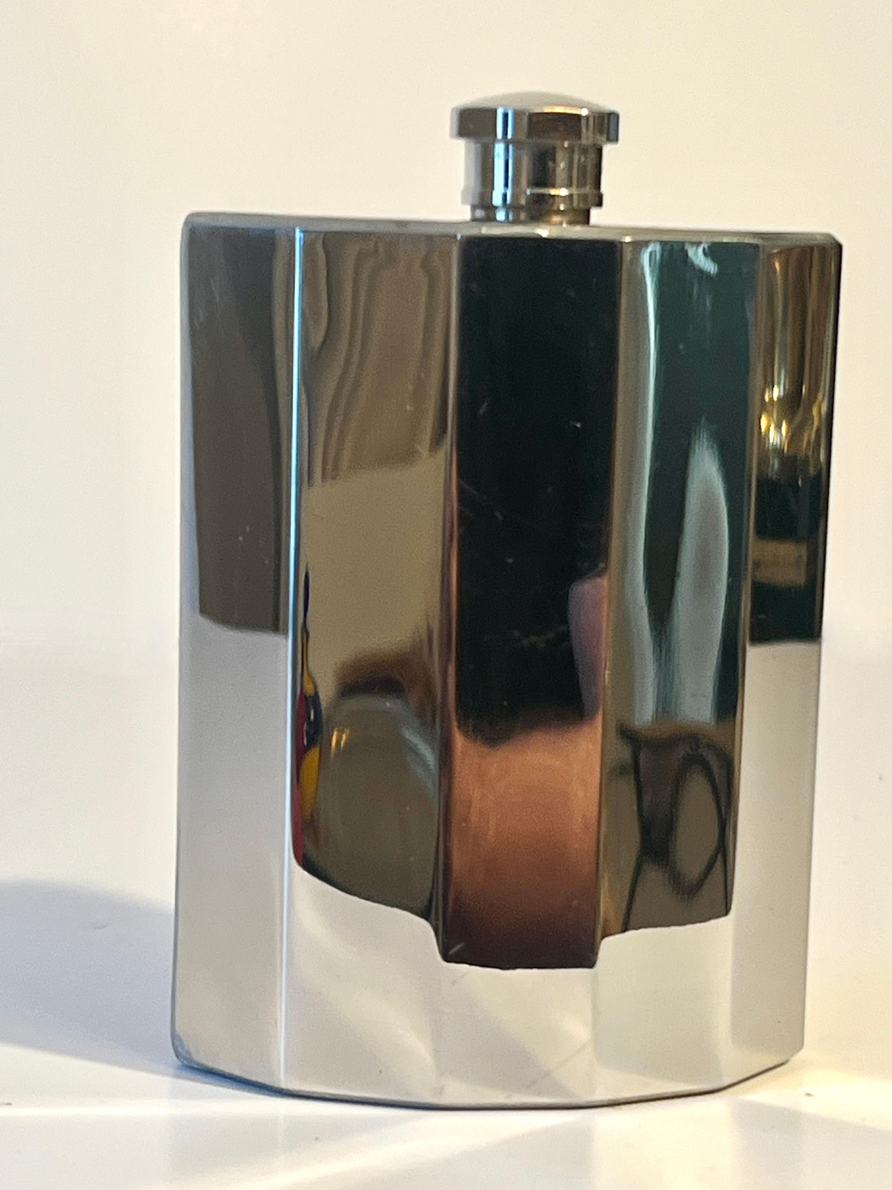 Polished Crescent Shaped Ribbed Flask with Screw Lid For Sale