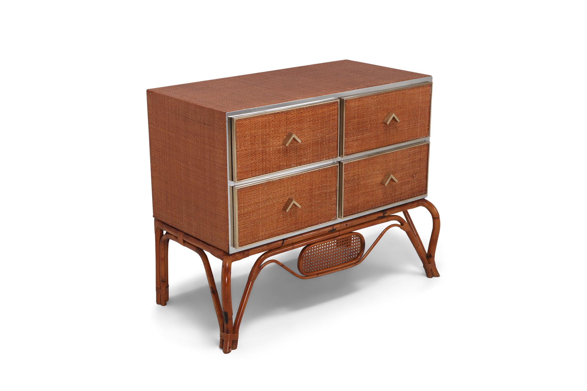Eclectic chest of drawers made in a variety of 1970s chic materials like bamboo, rattan, brass and chrome.
An unusual combination that make this piece like no other.
Fits well in a new metropolitan Hollywood regency interior inspired by the