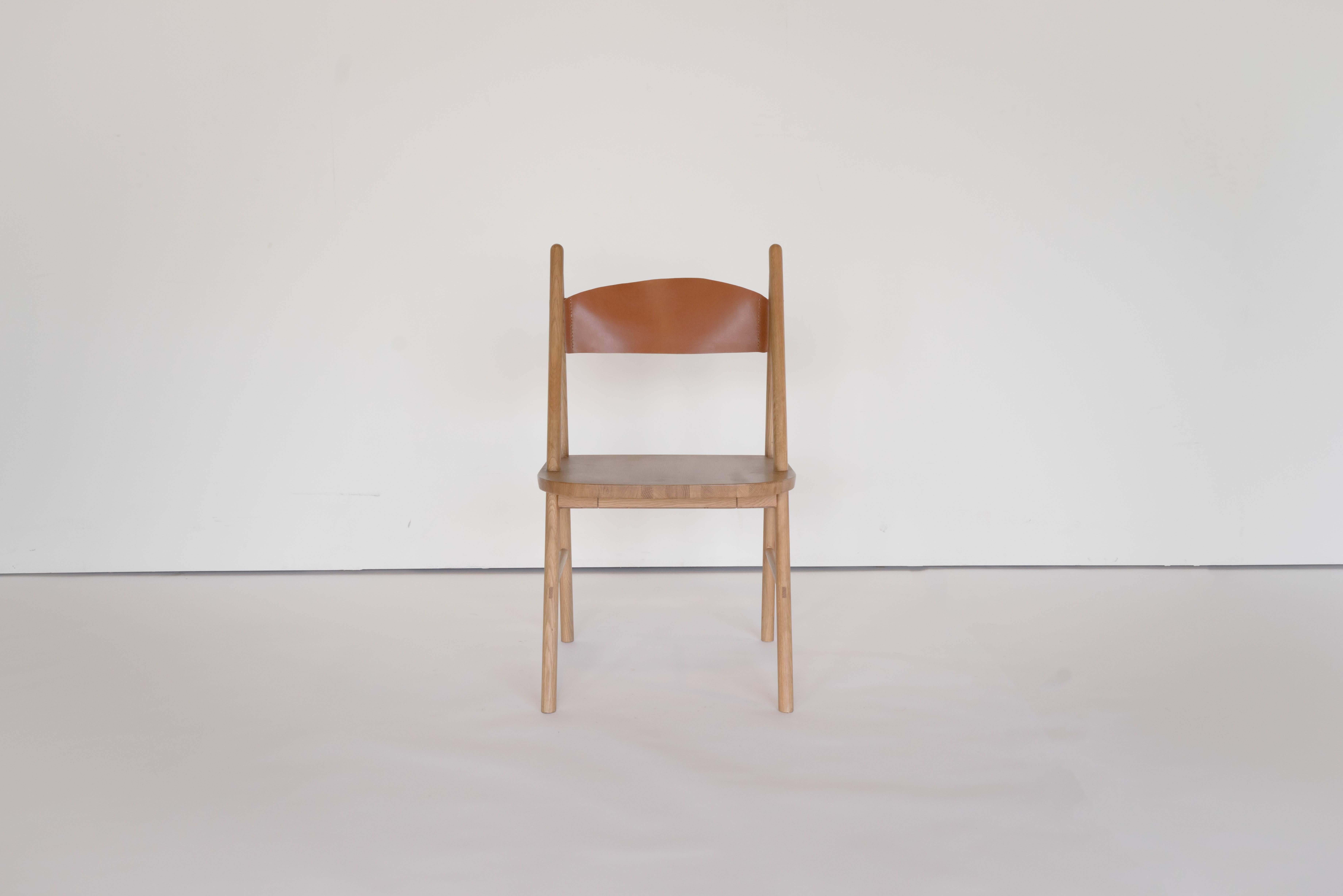 Sun at Six is a contemporary furniture design studio that works with traditional Chinese joinery masters to handcraft our pieces using traditional joinery. A concave leather back makes this dining chair a good choice for lounging and long