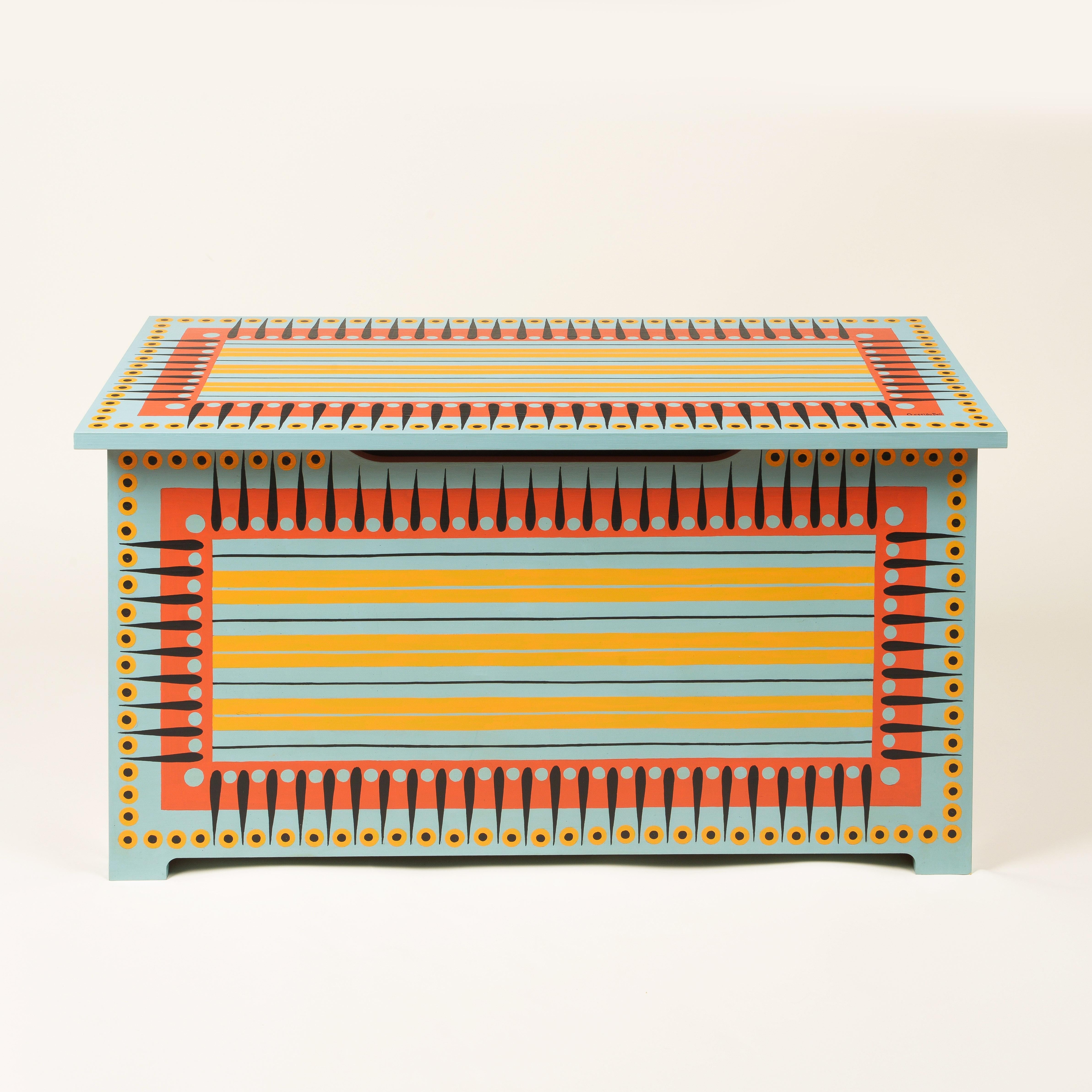 Blanket chest of rectangular form with hinged lid; handpainted and signed by the artist; opening to a red painted interior.