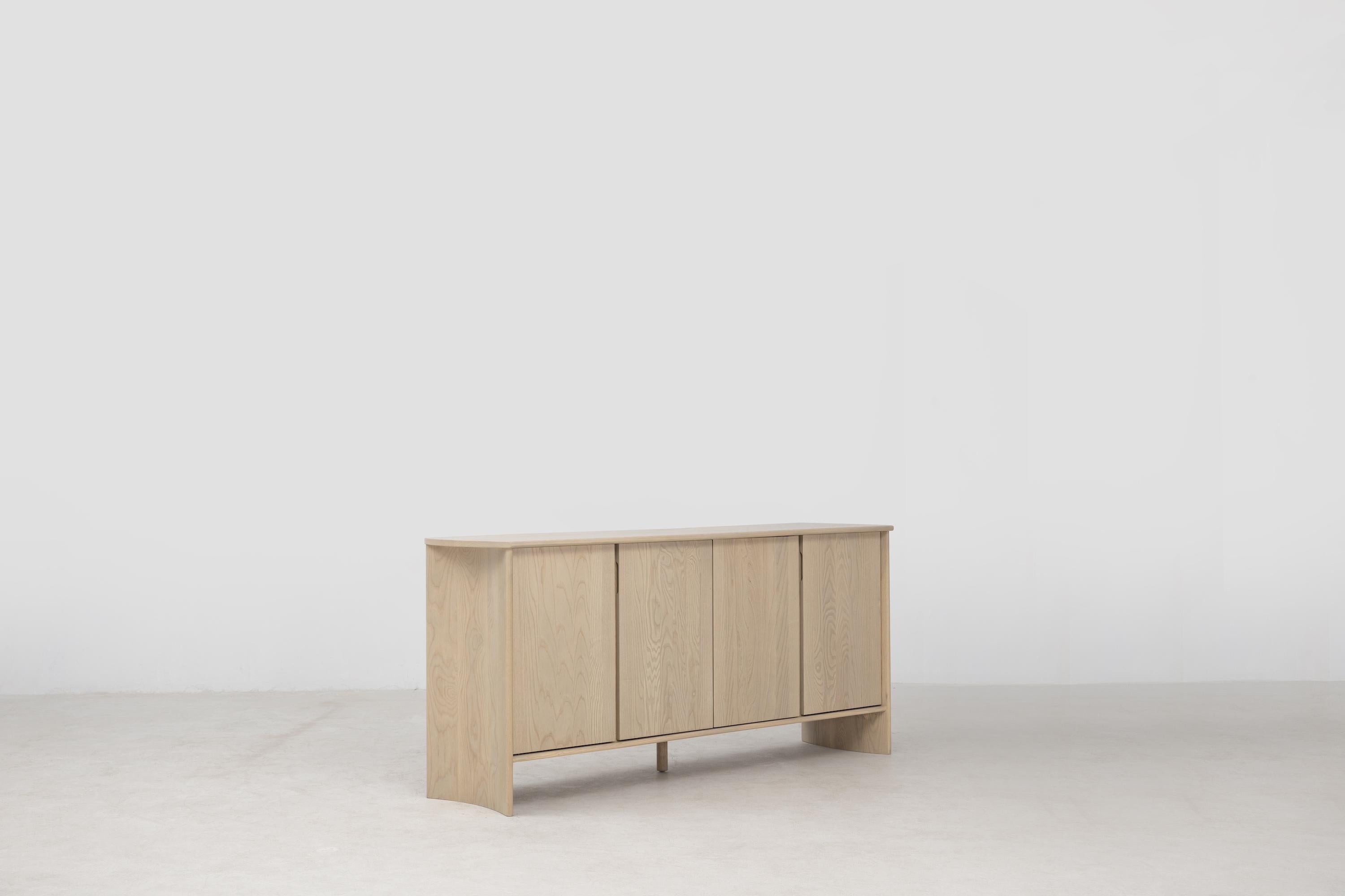 The Crest Sideboard is an extension of the classic Crest collection, featuring the curved columnar legs of the classic Crest Table. The sideboard frame is made using traditional joinery, with nails and screws used only for the drawer hardware. The