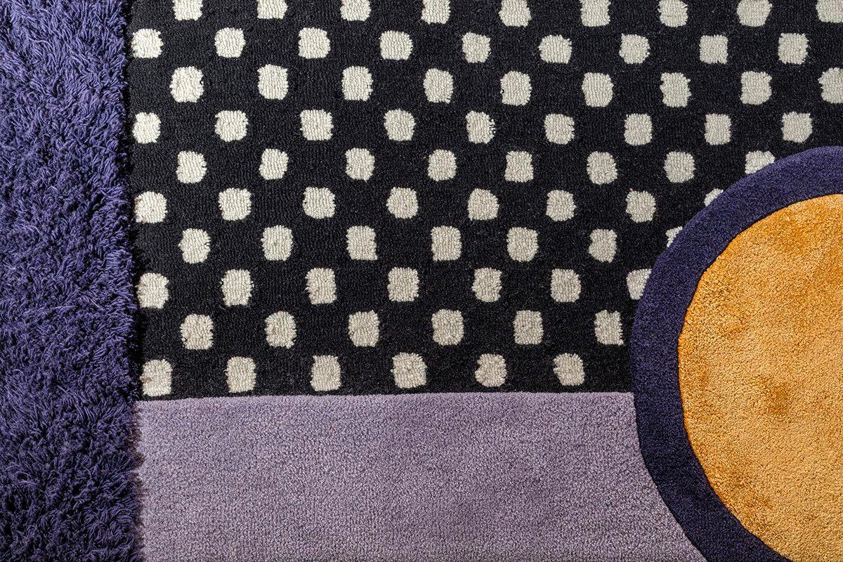 The Crest I track tapestry rug draws inspiration from the starting line of tracks run by athletes in the ancient Olympic Games. Contrasting colors and strong shapes combine to create an eclectic geometric vibe. This rug is hand-tufted in India, made