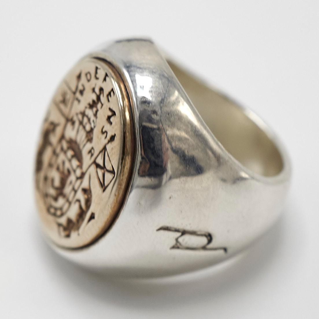 Crest Signet Ring Sterling Silver Bronze Unisex J Dauphin can be worn by women or men.

Inspired by Queen Mary of Scots ring. Gold signet-ring; engraved; shoulders ornamented with flowers and leaves. Oval bezel set with silver intaglio depicting