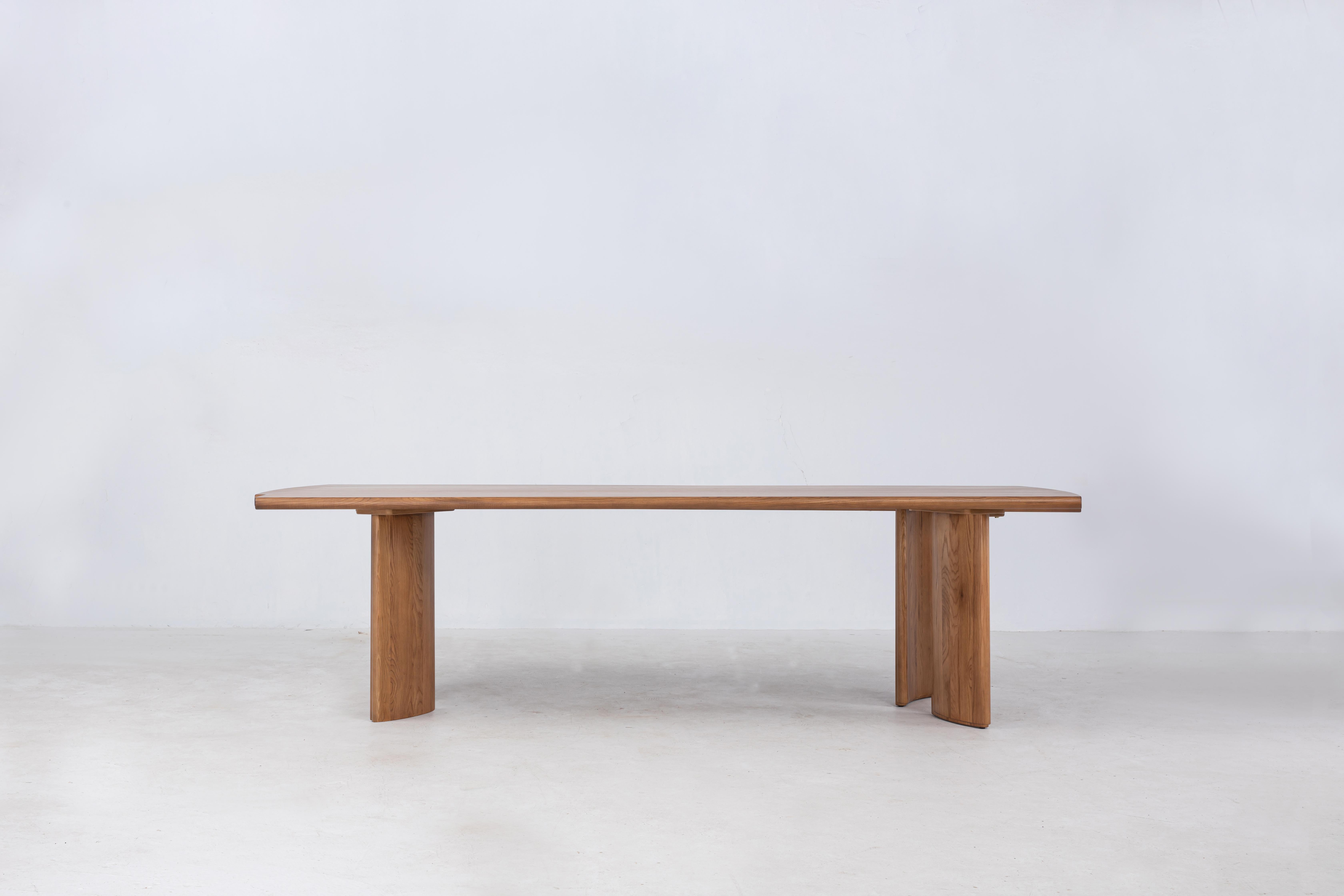 The Crest Table is our solid slab dining table made from FSC white ash. The heavy, solid wood slab is set on curved, offset columnar legs. We’ve designed this piece with legs detached for easy moving.

This table is designed around the concept of a