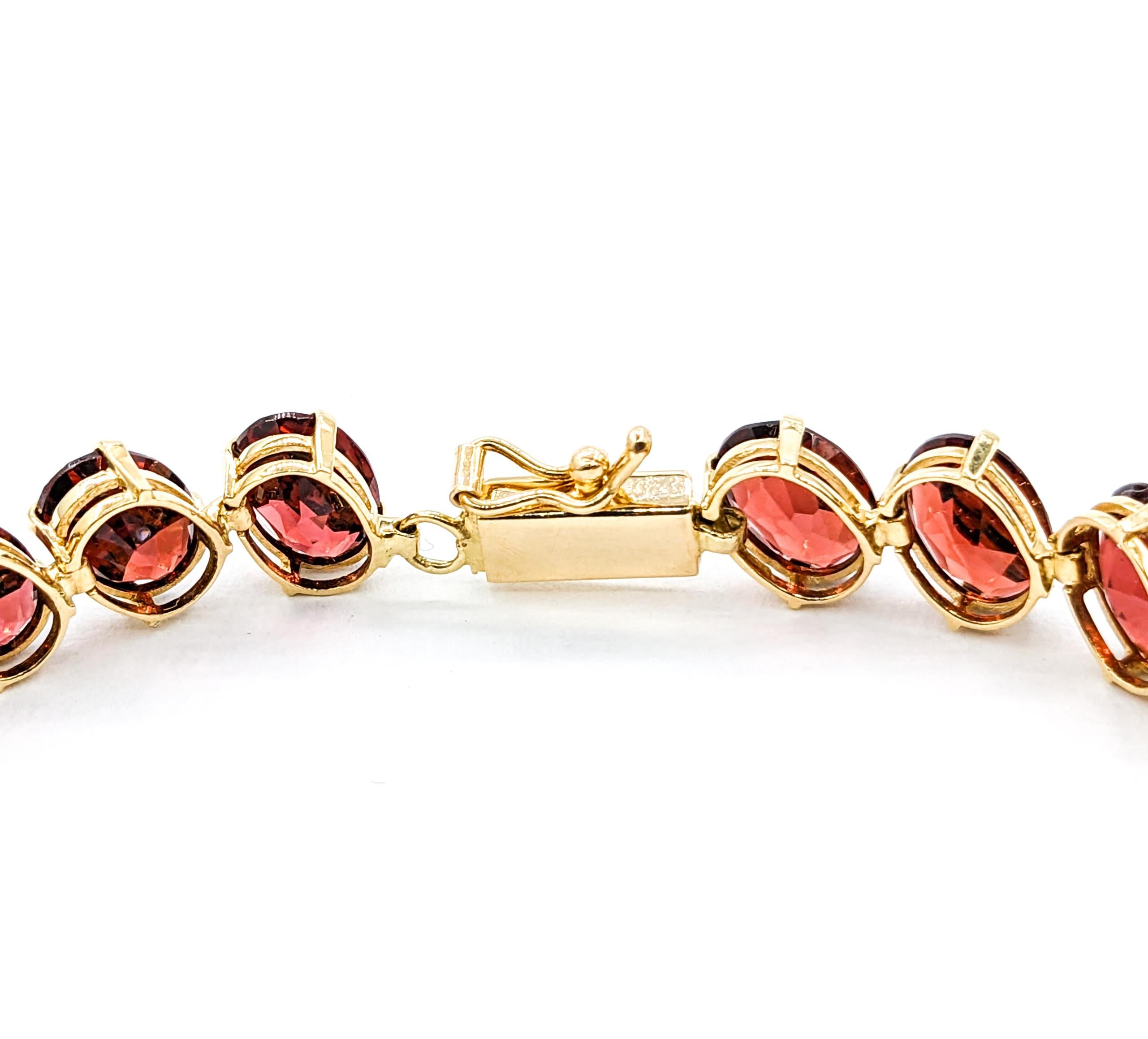 Crimson 26,6ctw Oval Granat-Tennisarmband aus Gelbgold 5