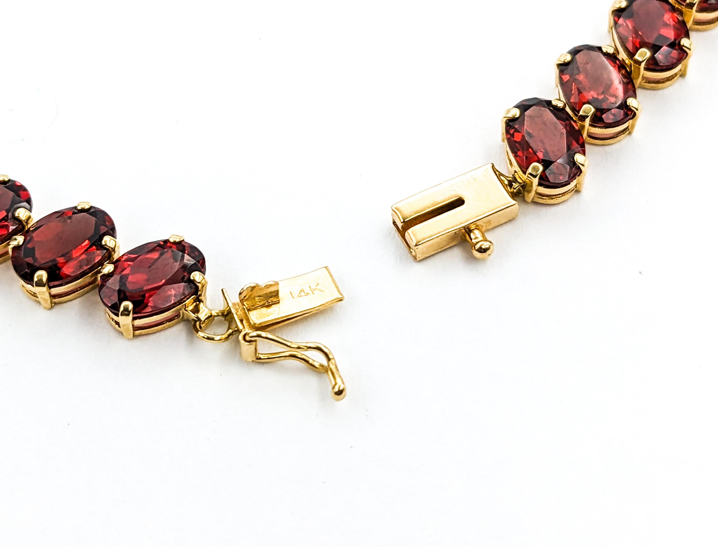 Crimson 26,6ctw Oval Granat-Tennisarmband aus Gelbgold 3