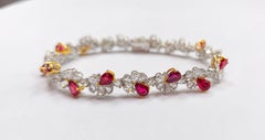 Crimson Halo - Natural Mozambique Pigeon's Blood Rubies set with Rosecut Diamond