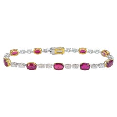 Crimson Majesty - Fine Mozambique Rubies set with Oval Diamonds in 18K Bracelet