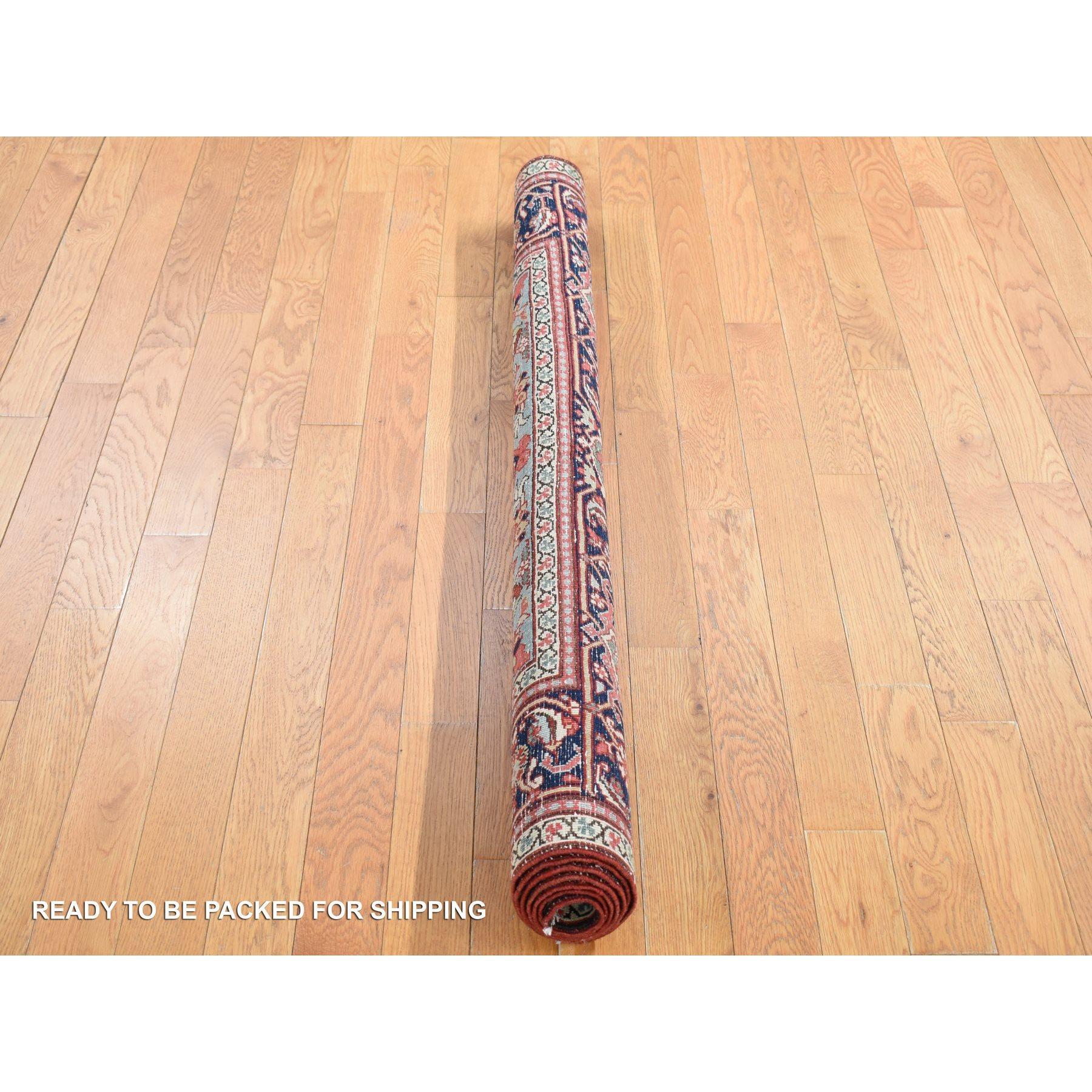 Early 20th Century Crimson Red Antique Persian Serapi Heriz Clean Even Wear Hand Knotted Wool Rug For Sale