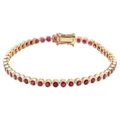 Bracciale tennis in oro giallo con rubino rotondo da 5,56 carati