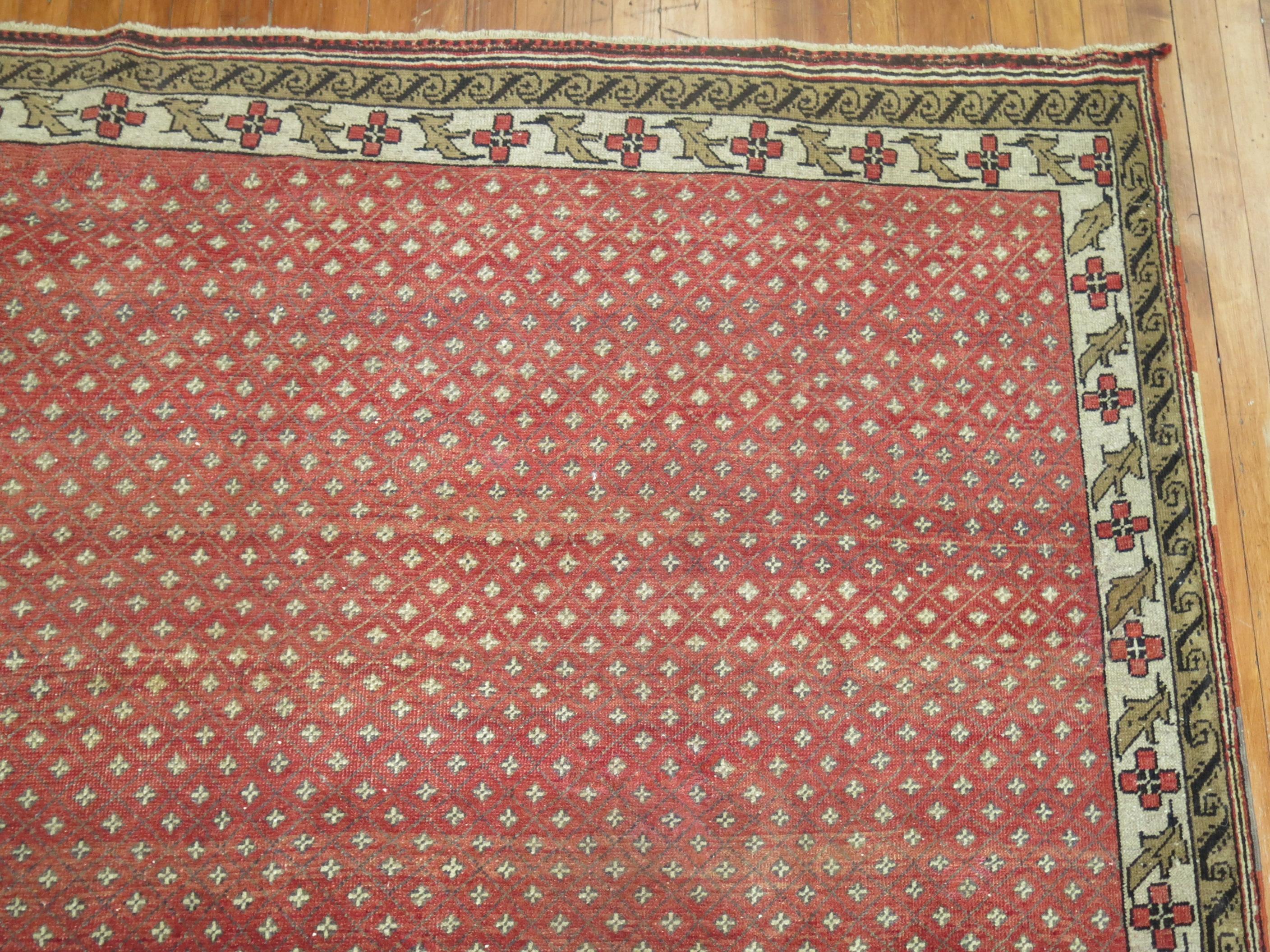 Room size mid-20th century Anatolian rug in crimson red.

7' x 9'7''