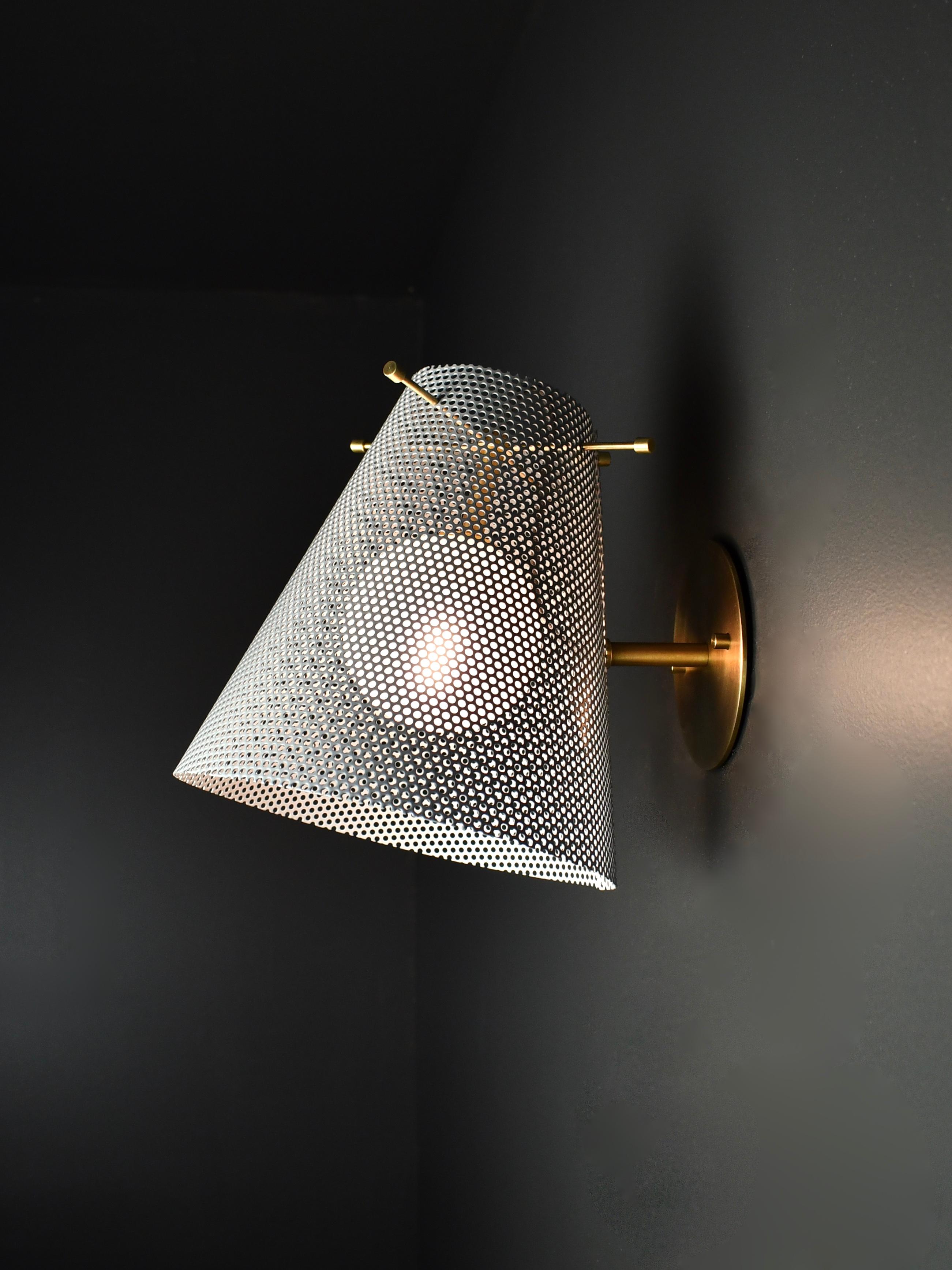 The Voile wall sconce is a handsome sculptural design that works well in both modern and transitional interiors. Shown here in our Dove (medium gray) enamel and Bronze hardware. Designed by Blueprint Lighting, 2020. This design is part of our Tulle