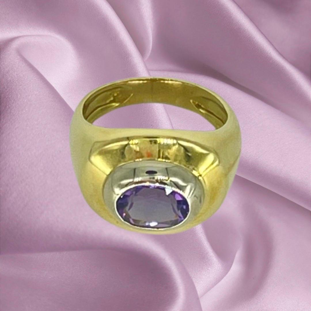 Criso Oval Amethyst Two-Tone Gold Earring, Ring and Pendant Set 18k Gold. This is a very beautiful and bold set handcrafted to perfection in 18 karat gold. The total weight is 18.4 grams with measurements as follows:
Earrings measure 16mm X 14mm