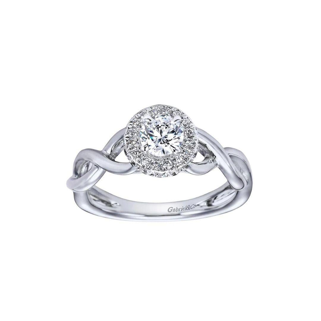 Criss Cross Design Diamond Halo Engagement Ring in 14k White Gold.﻿ Center diamond weighs 0.45ct, J color, VS2 clarity, round brilliant cut. Side diamonds are  0.30ctw, H color, SI1 clarity.