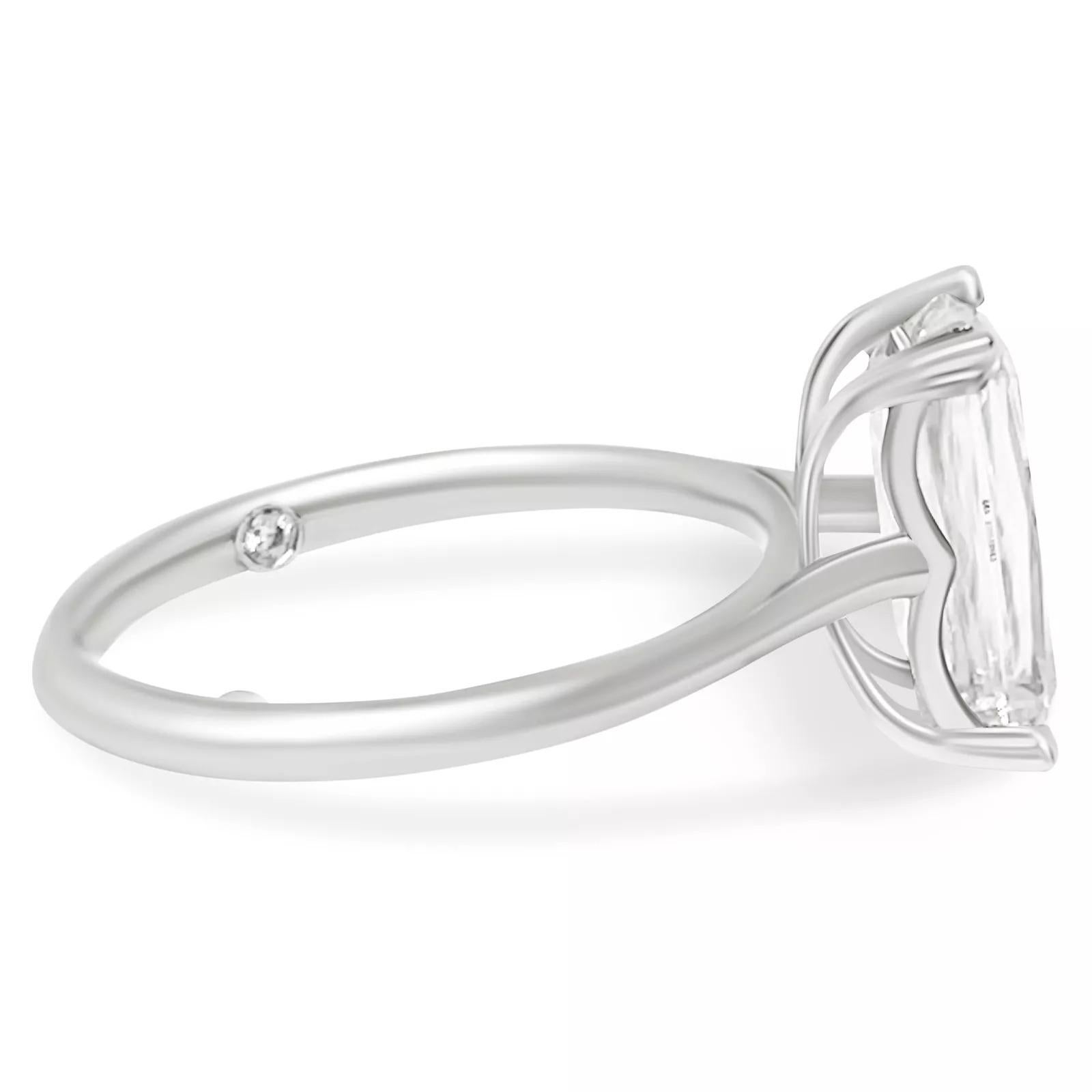 Crisscross 3.50 Carat Emerald Cut Moissanite Solitaire 14k White Gold Engagement

Beautiful variation of a classic emerald cut diamond with crisscross faceting. This elongated, rare cut emphasized clarity and its breathtaking shape. The mounting is
