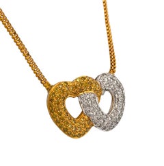 Crisscross Heart Shaped Yellow And White Pendant